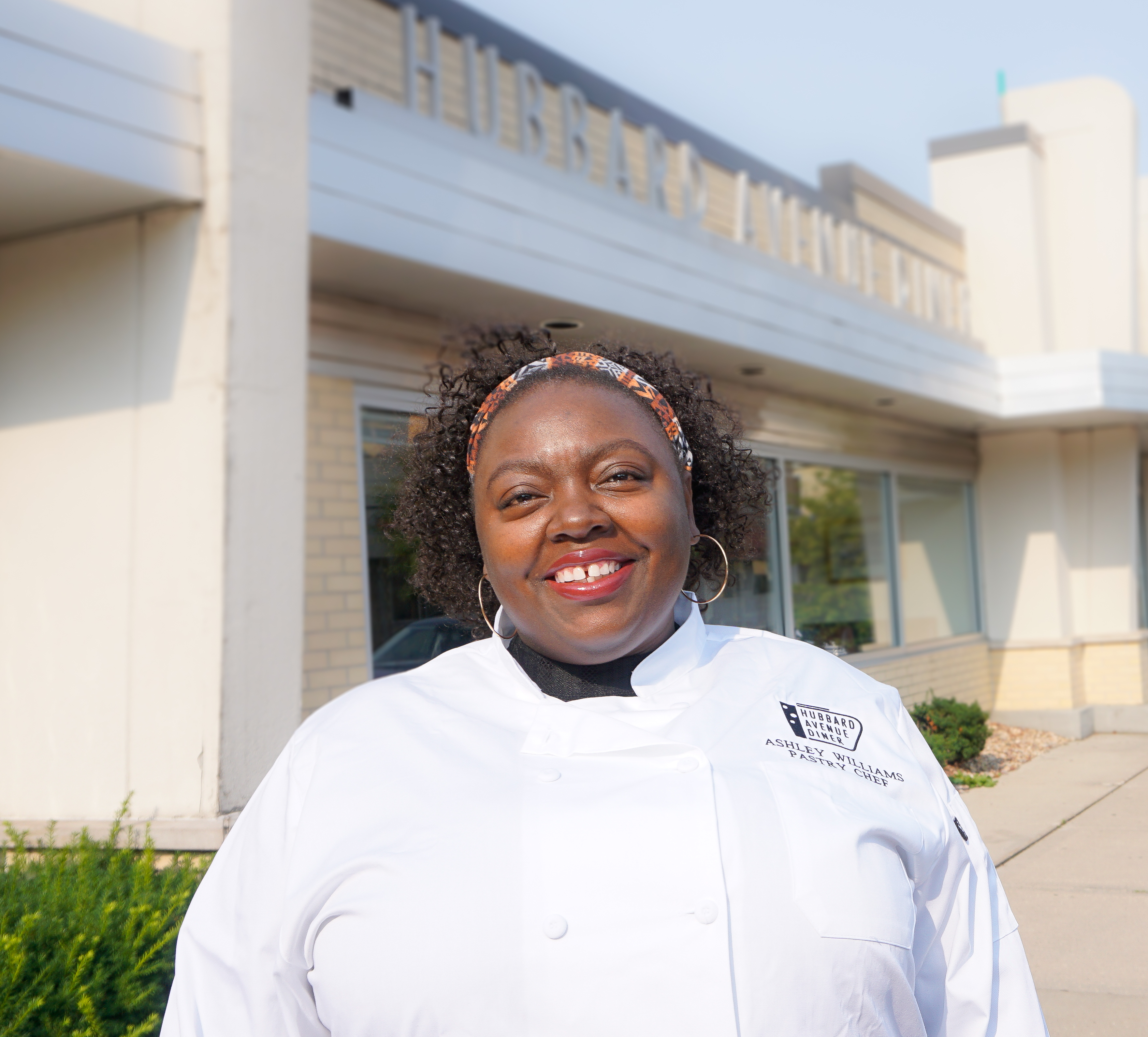 a man standing in front of a building