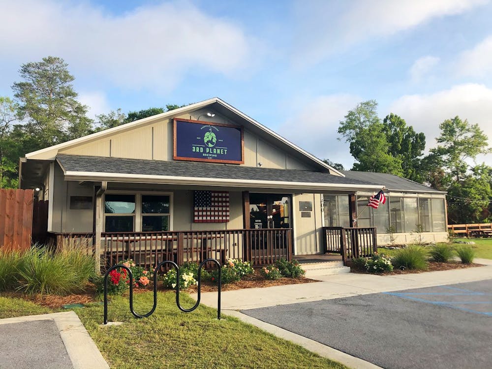 a house that is parked on the side of a building