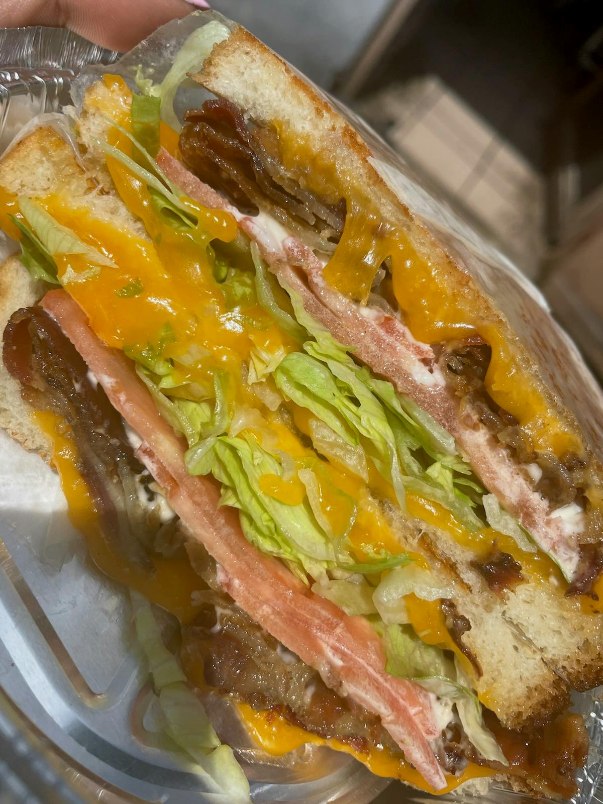 a close up of a hot dog on a bun
