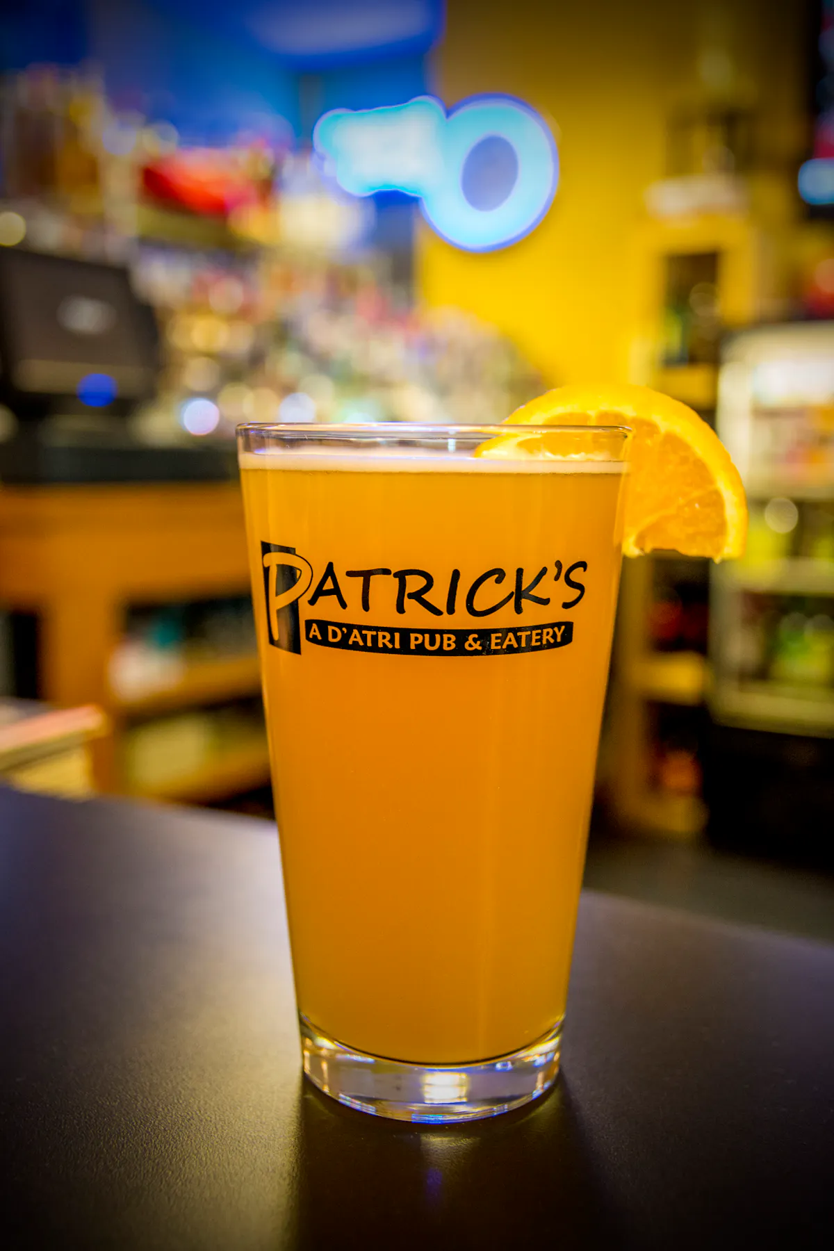 orange juice served on a tall glass