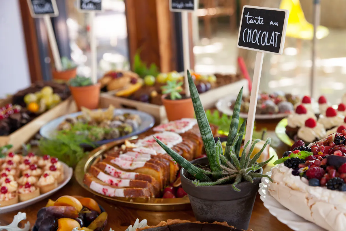 different food set on a table for a buffet
