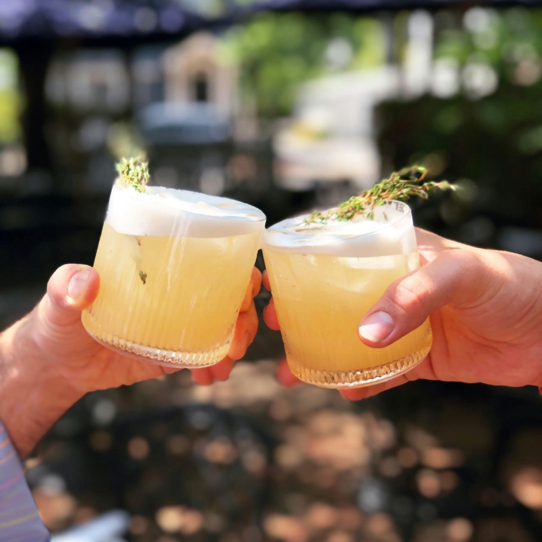 cheers with two drinks