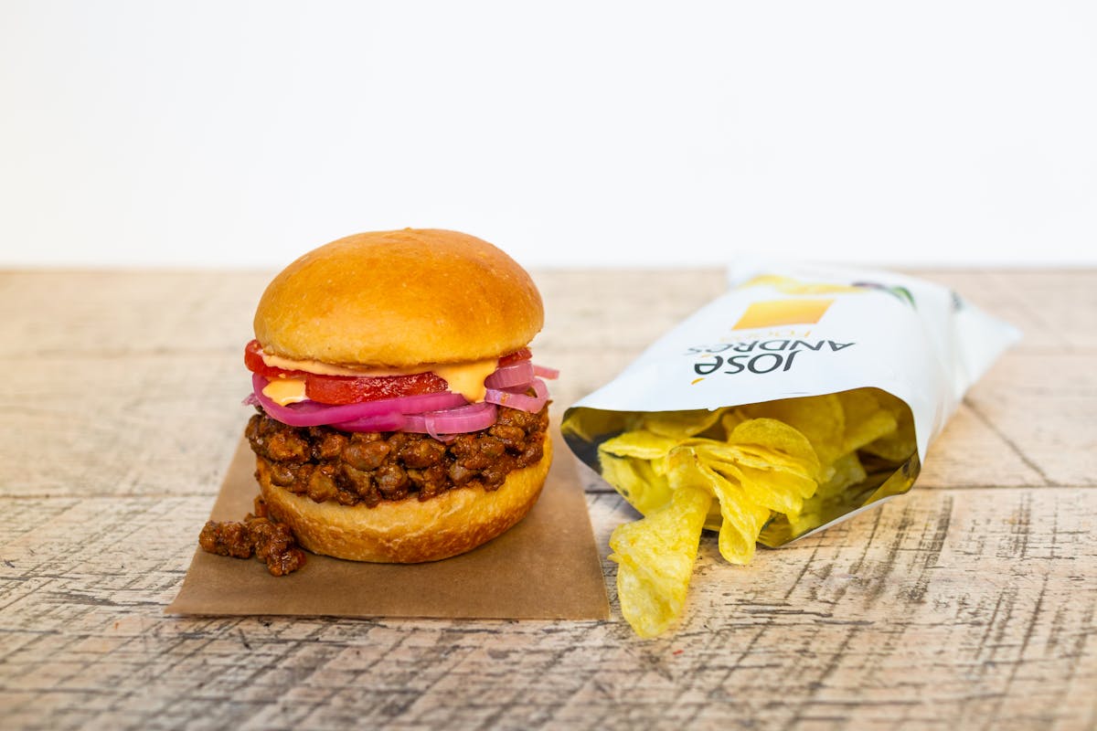 a cut in half sandwich sitting on top of a table