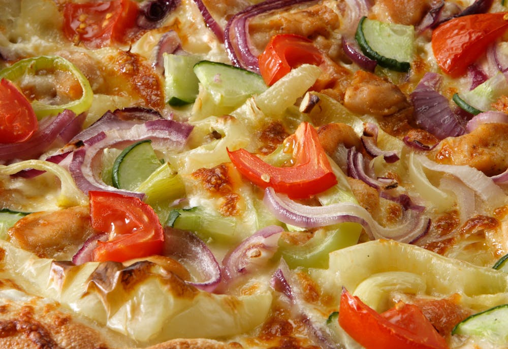 Image of vegetables on pizza