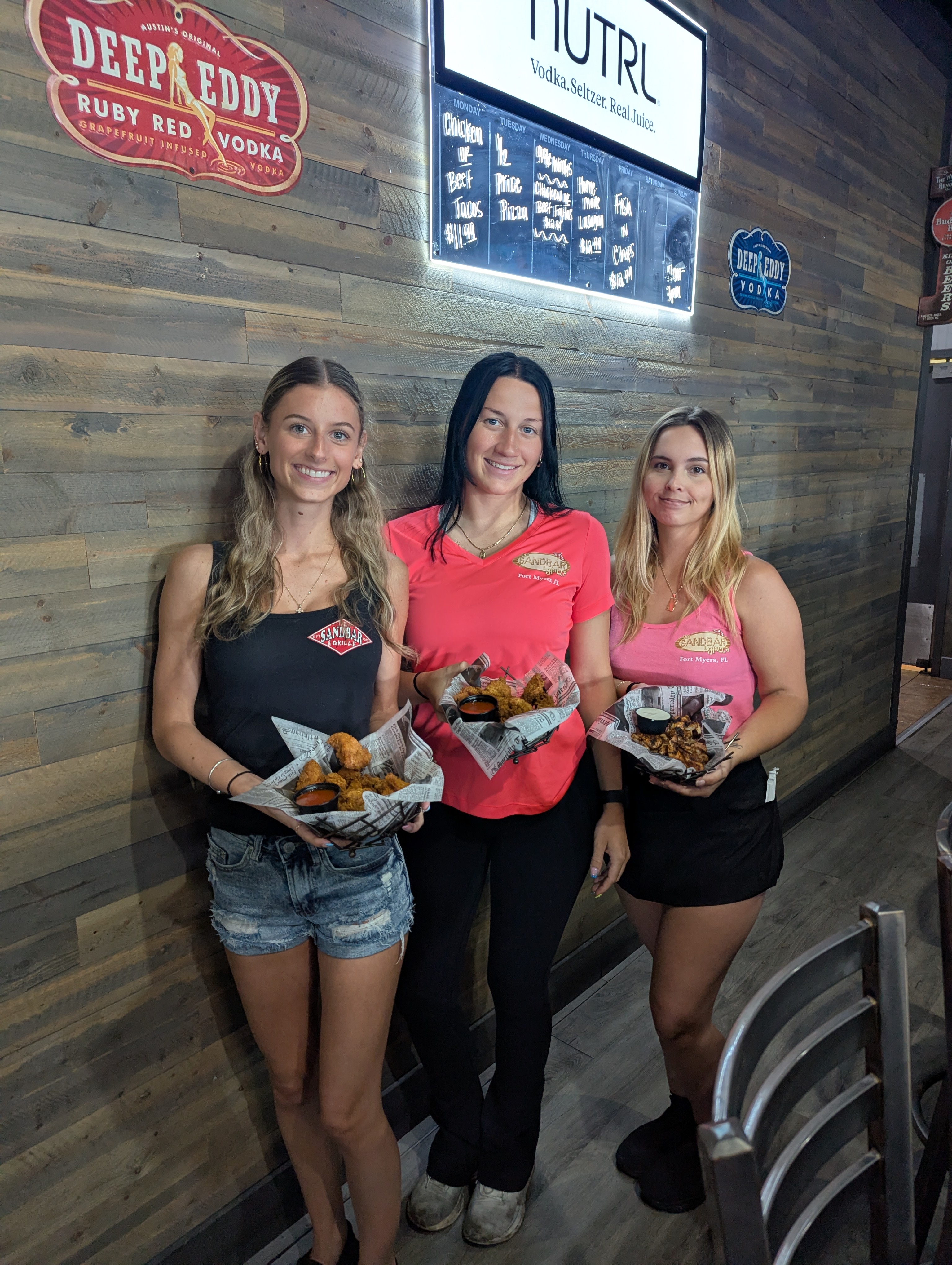 a group of people posing for the camera