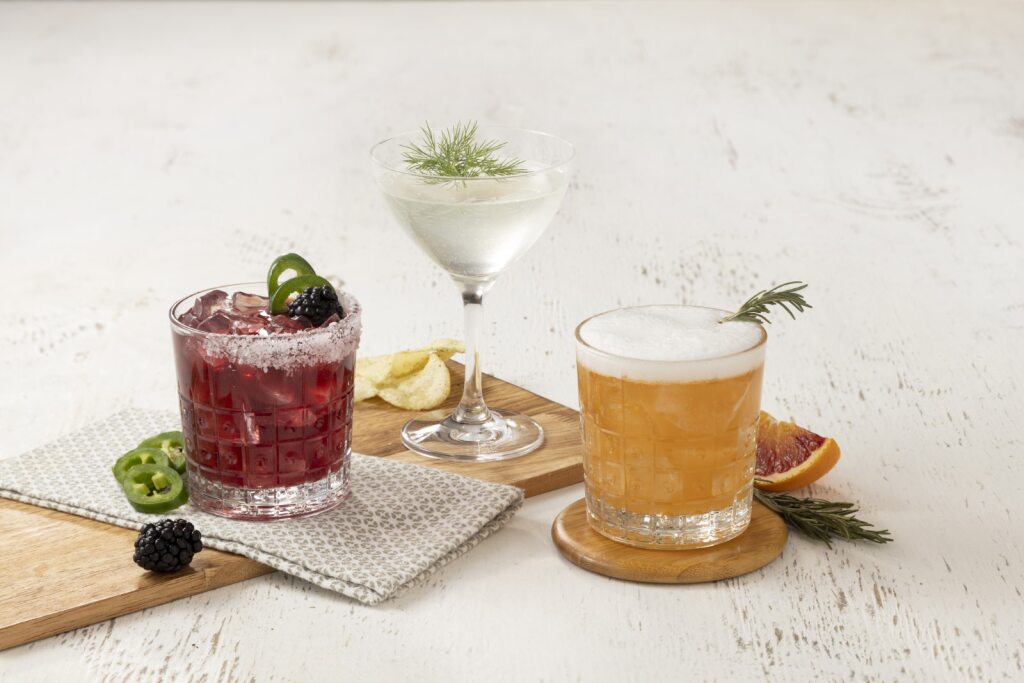 a vase that has some food on a table