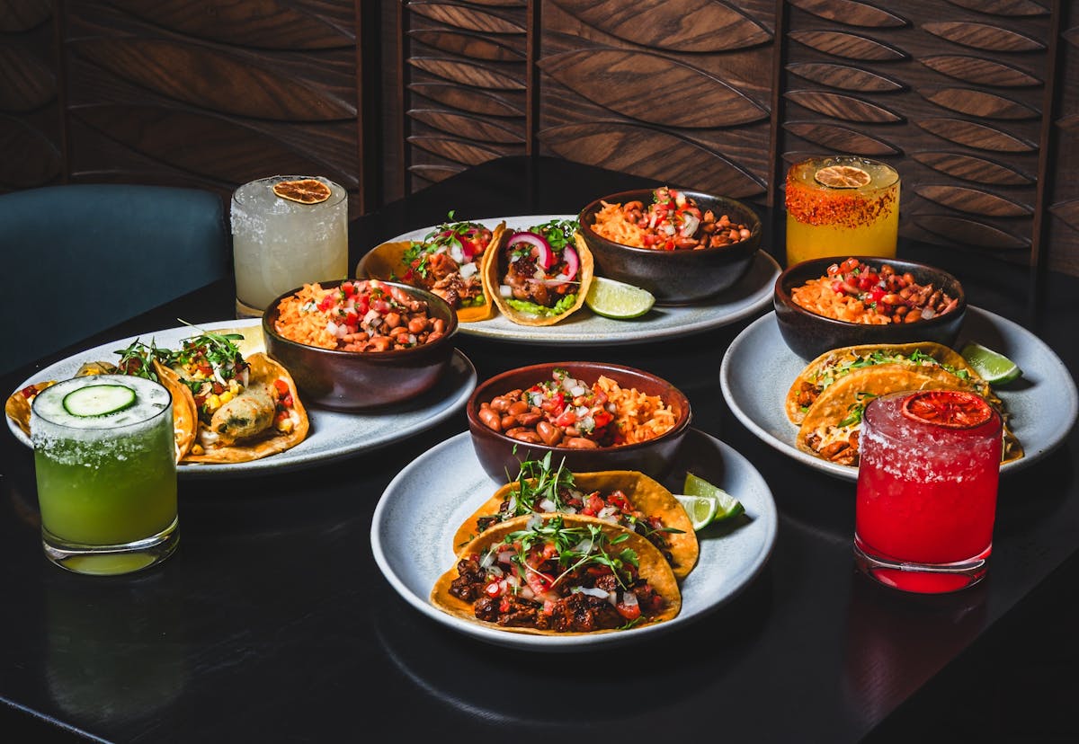 plates of tacos, rice, beans, and margaritas at the Las Vegas mexican restaurant called mijo inside durango casino and resort