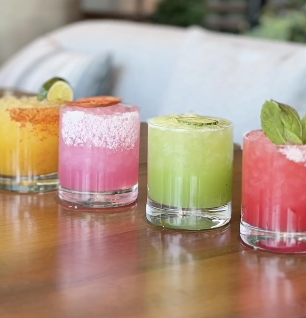 a photo of the four margaritas served at mijo and wax rabbit for national tequila day featuring codigo tequila