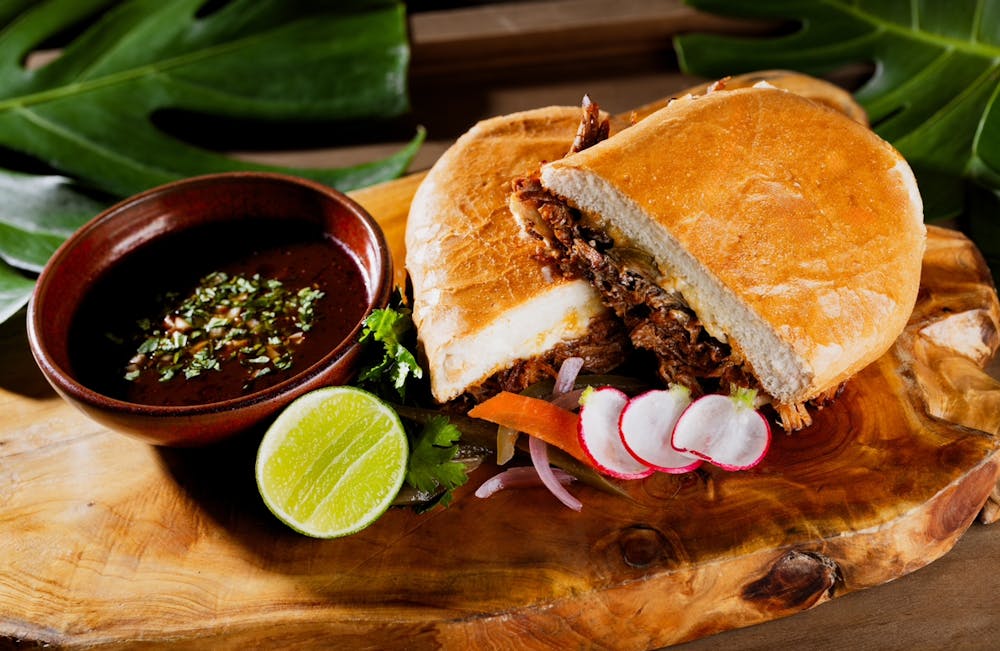 a photo of the Birria Torte Dip at Mijo Modern Mexican