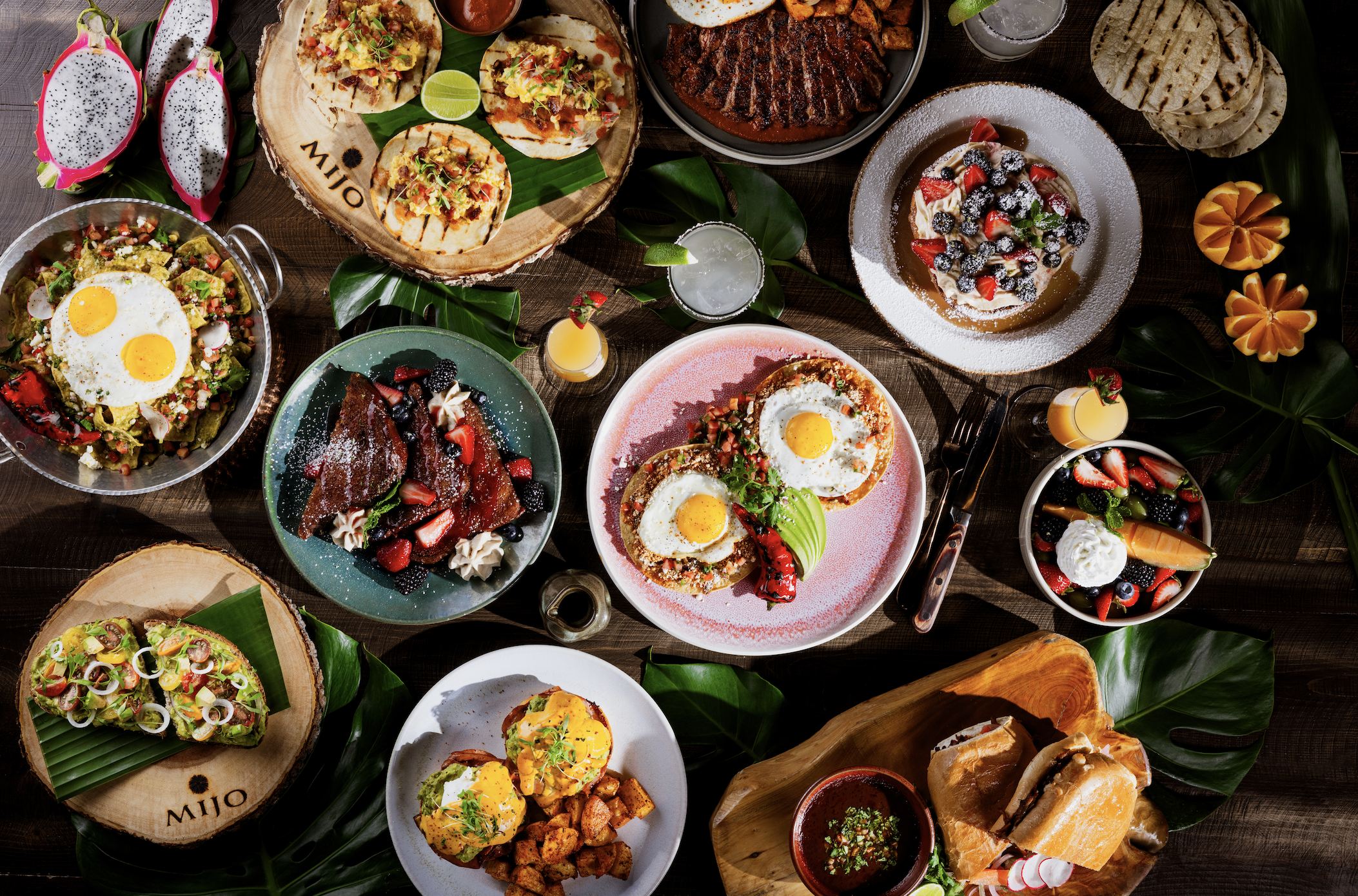 a photo of a brunch spread of brunch items available at mijo 