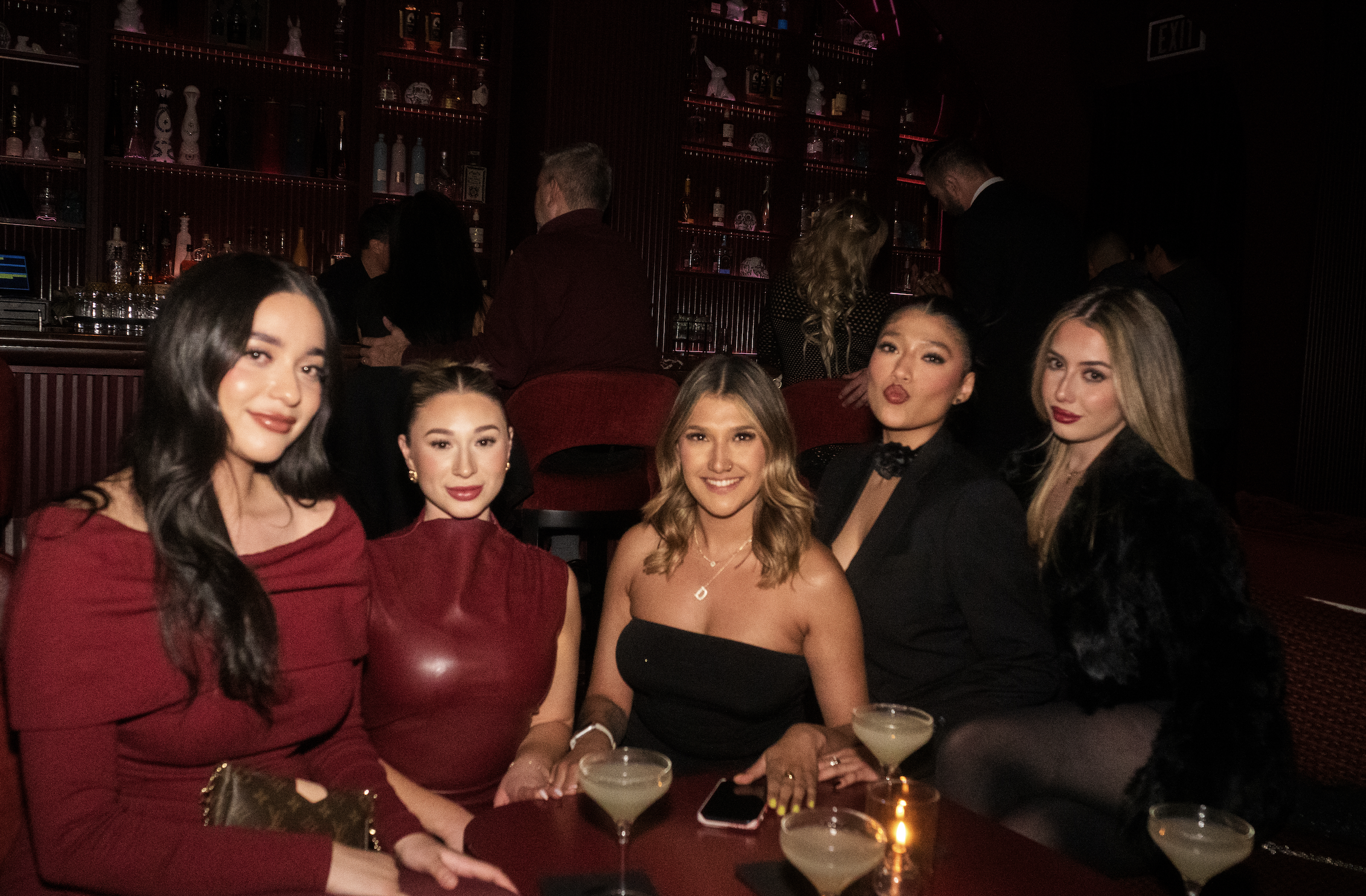 group of friends enjoying wax rabbits paradise fever event