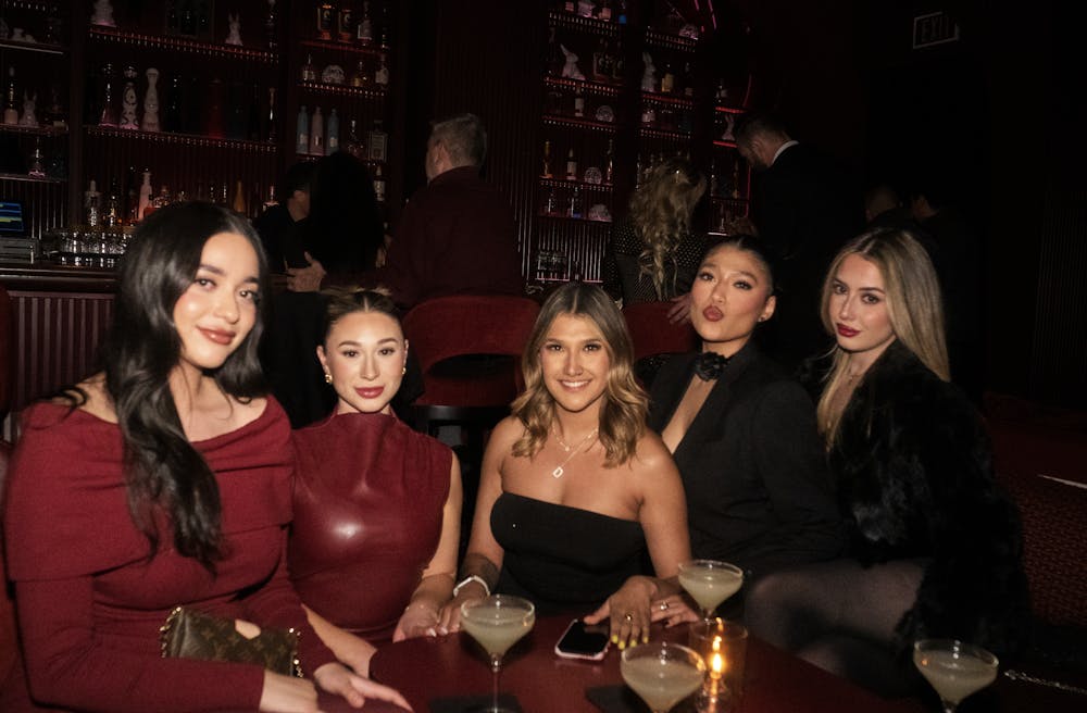 group of friends enjoying wax rabbits paradise fever event