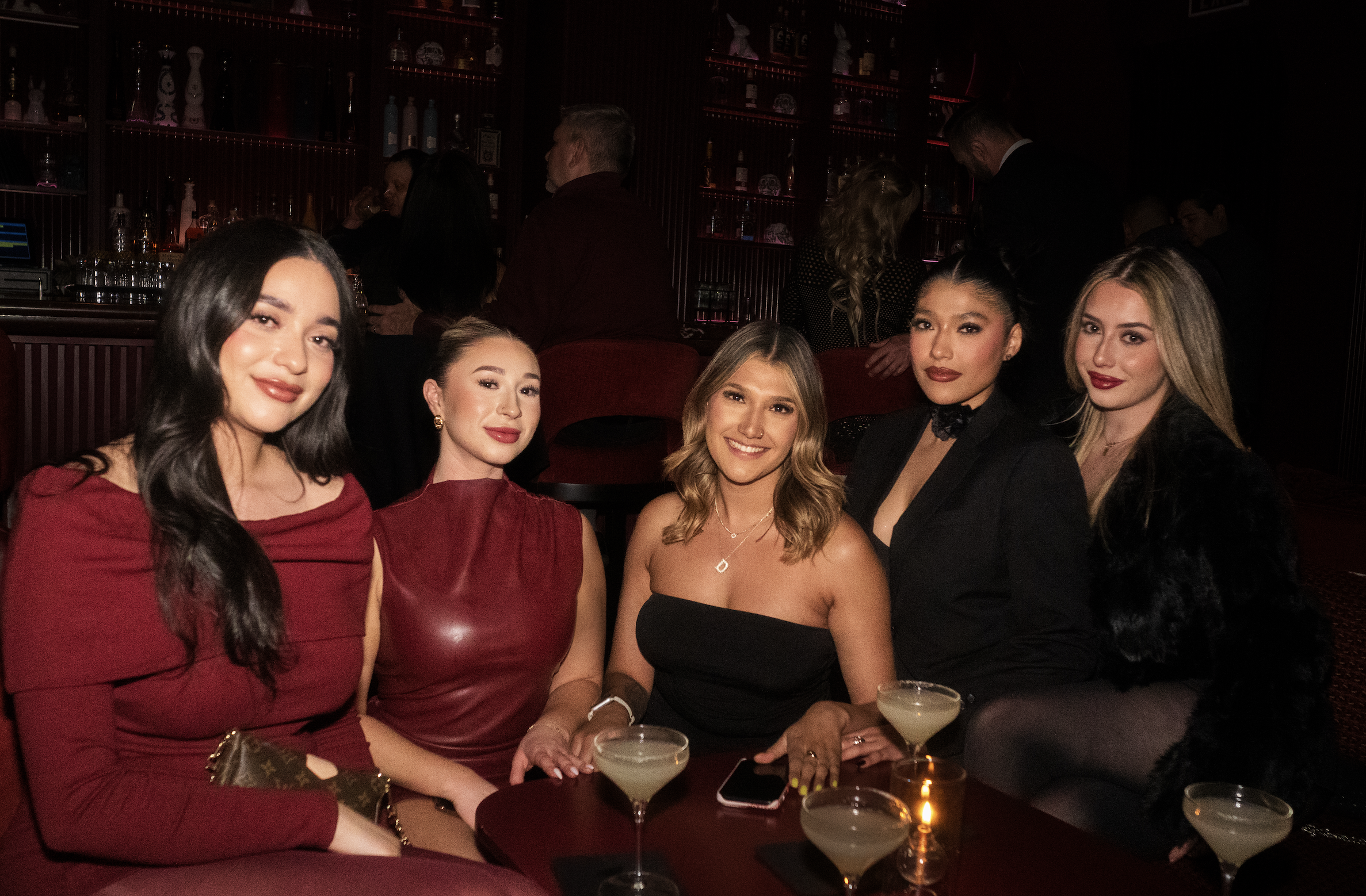 group of friends at this speakeasy in mijo modern mexican