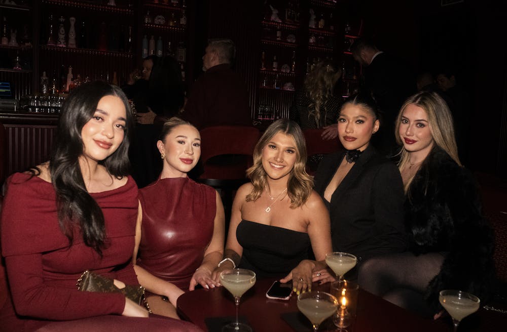 group of friends at this speakeasy in mijo modern mexican