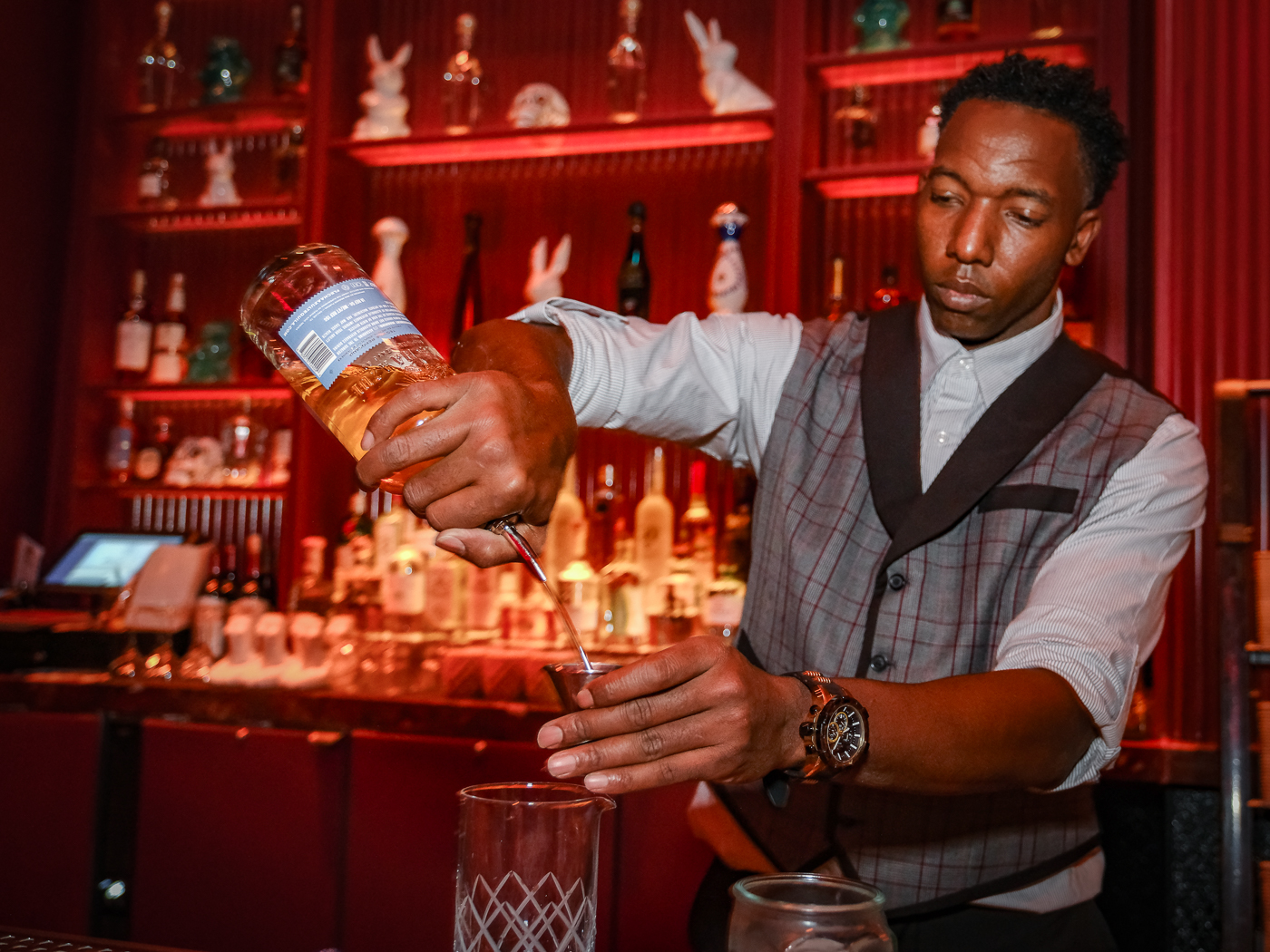 bartender serving drinks to paradise fever goers