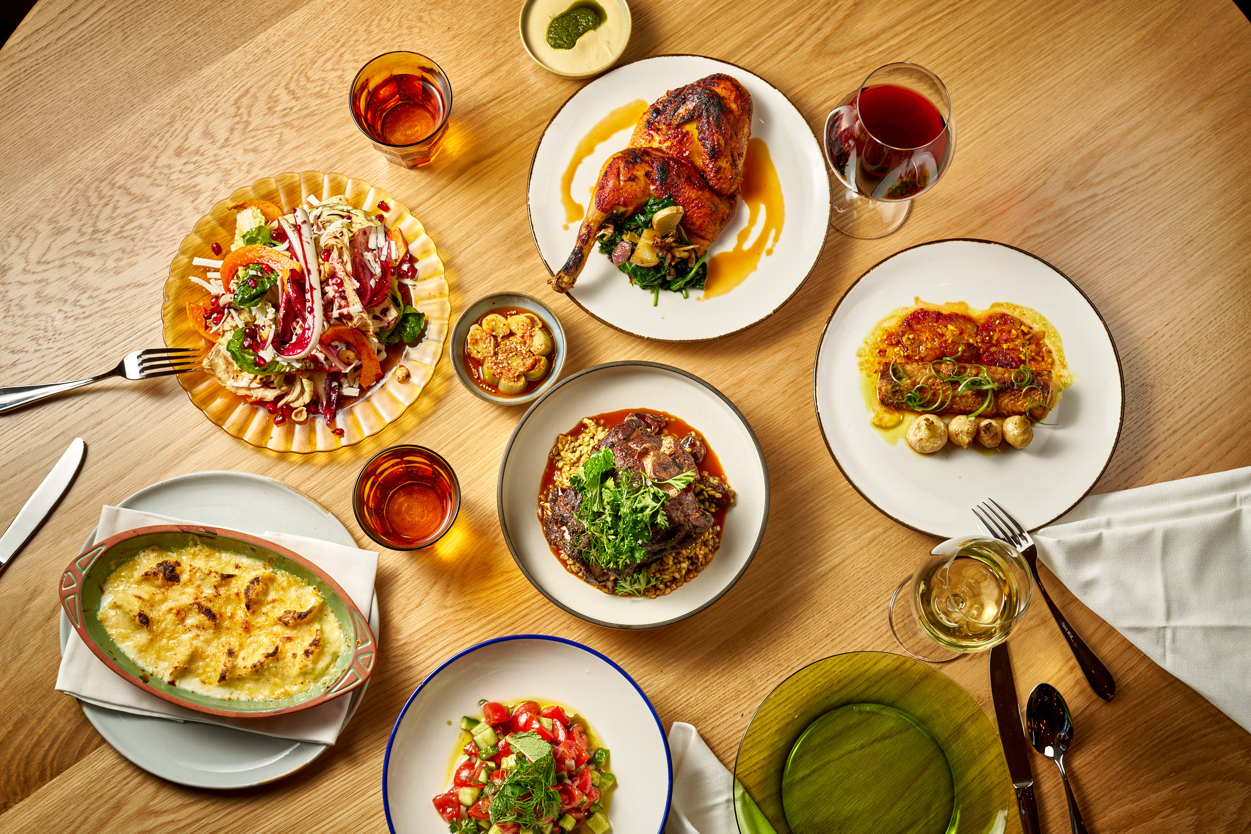 a table topped with different types of food on a plate