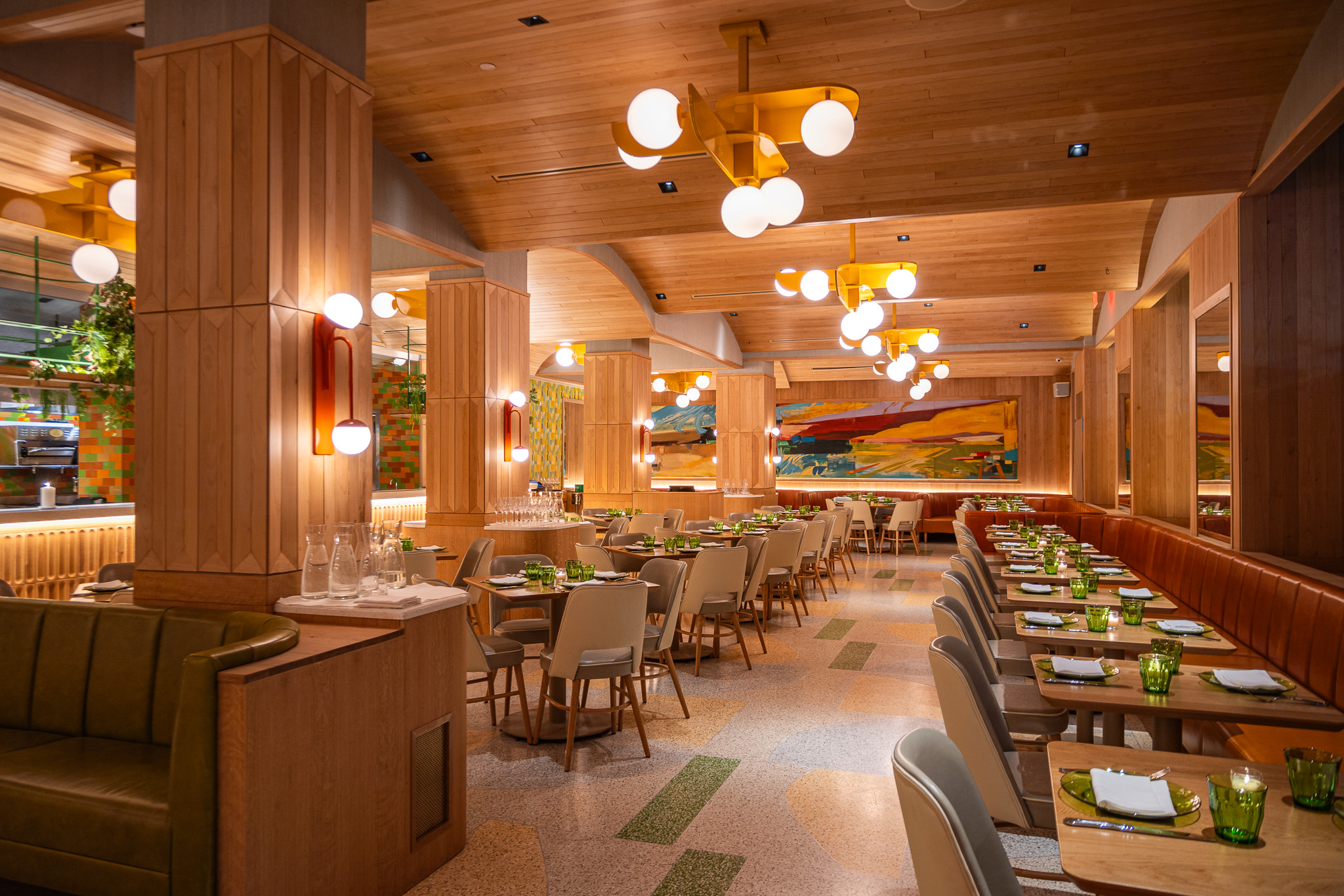a room filled with furniture on top of a wooden table