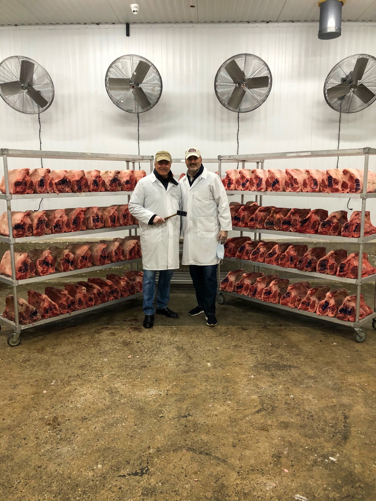 the owners in front of chops