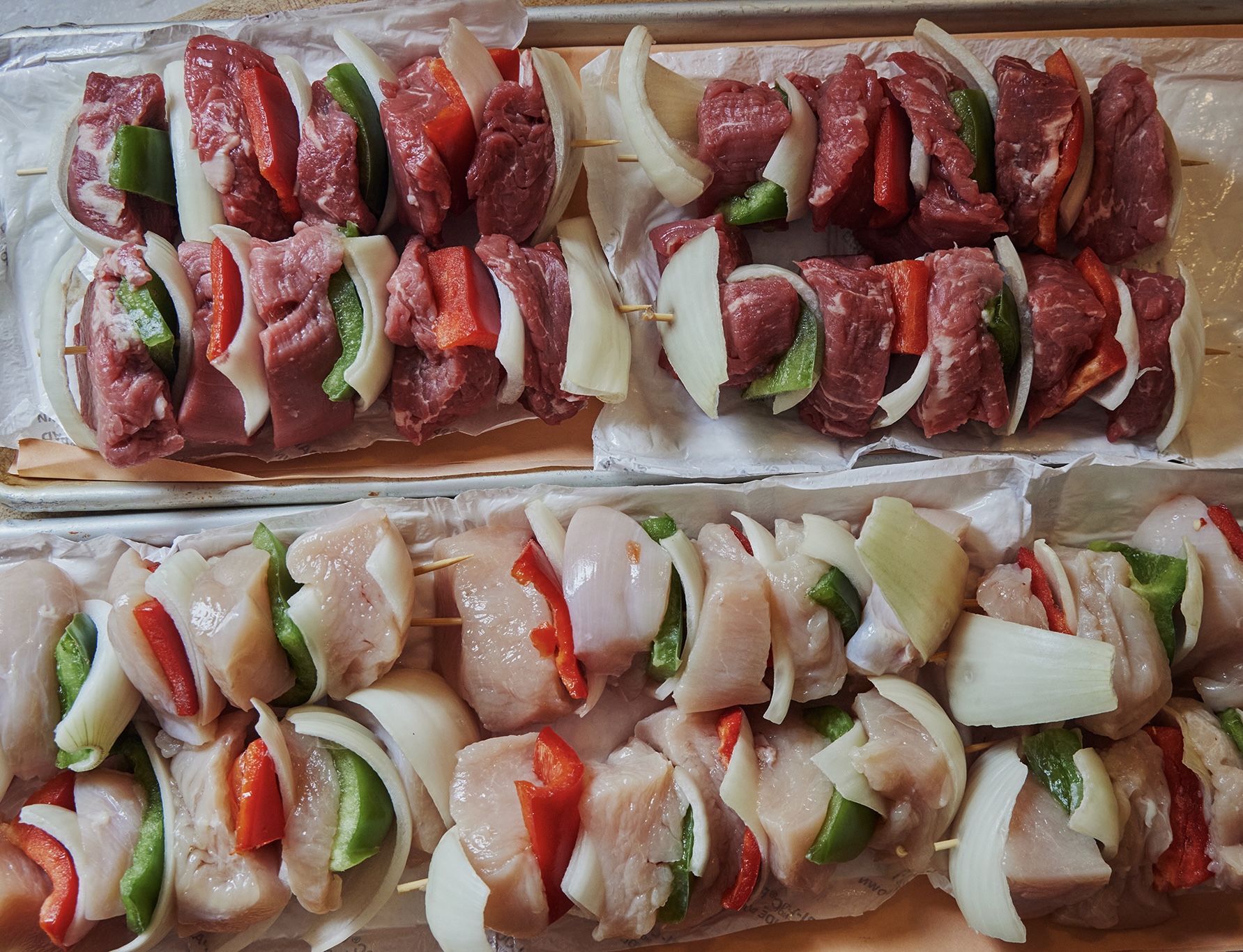 a group of plastic containers filled with food