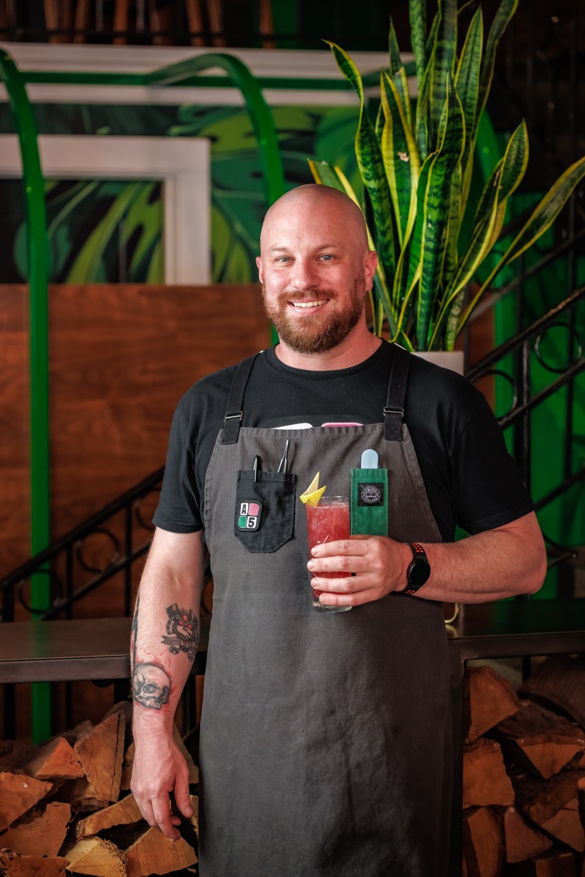 a man holding a wine glass