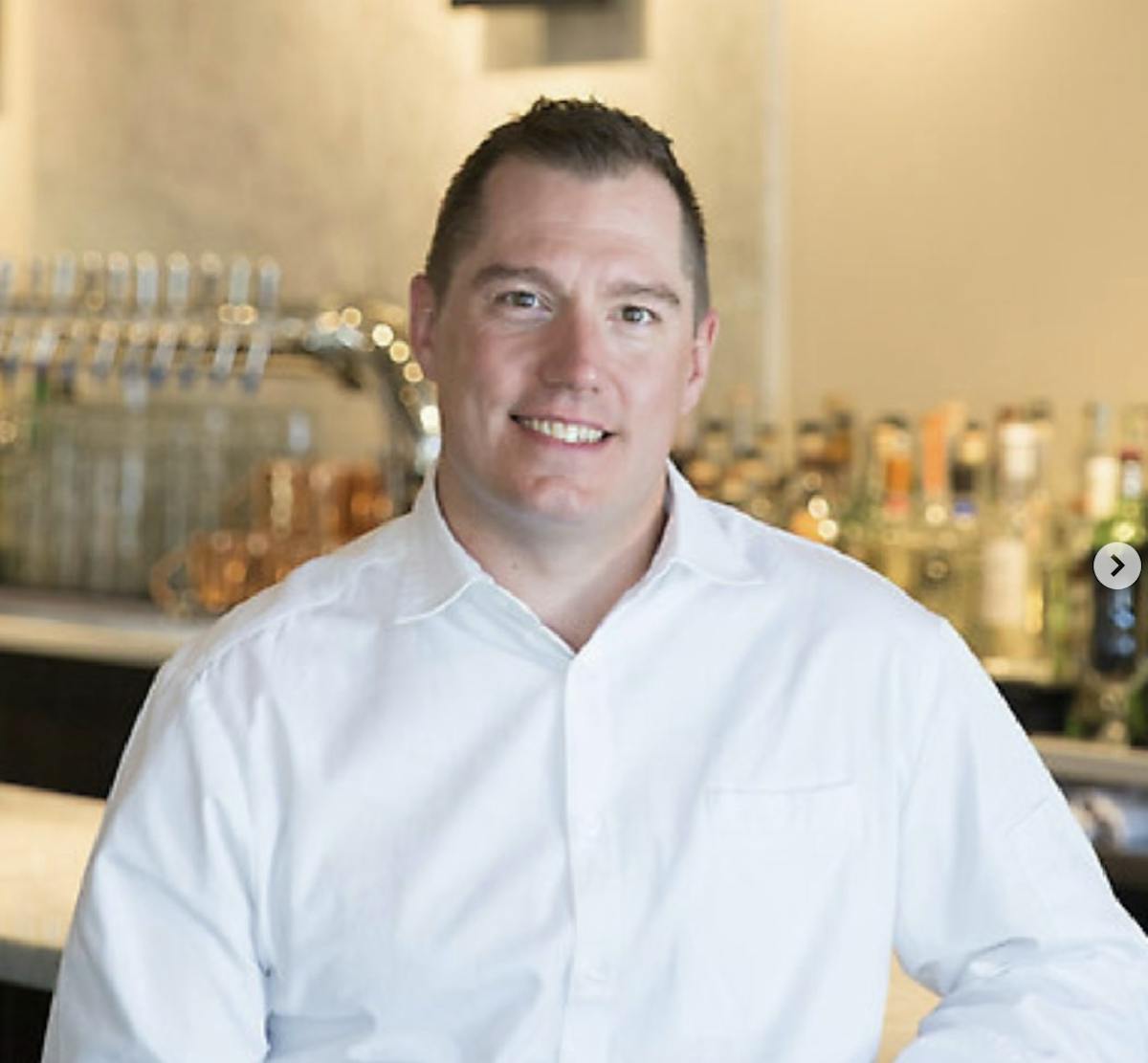 a man wearing a white shirt