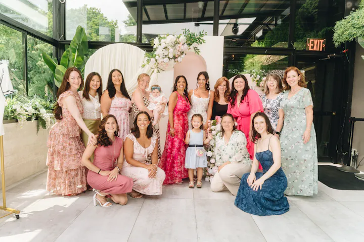 Celebration group photo in the glass atrium