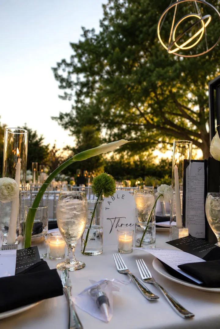 Candlelit tablescape set for a private event