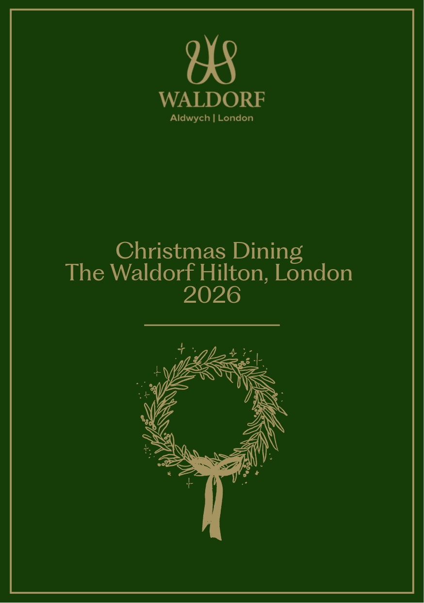 a green and gold cover with a wreath