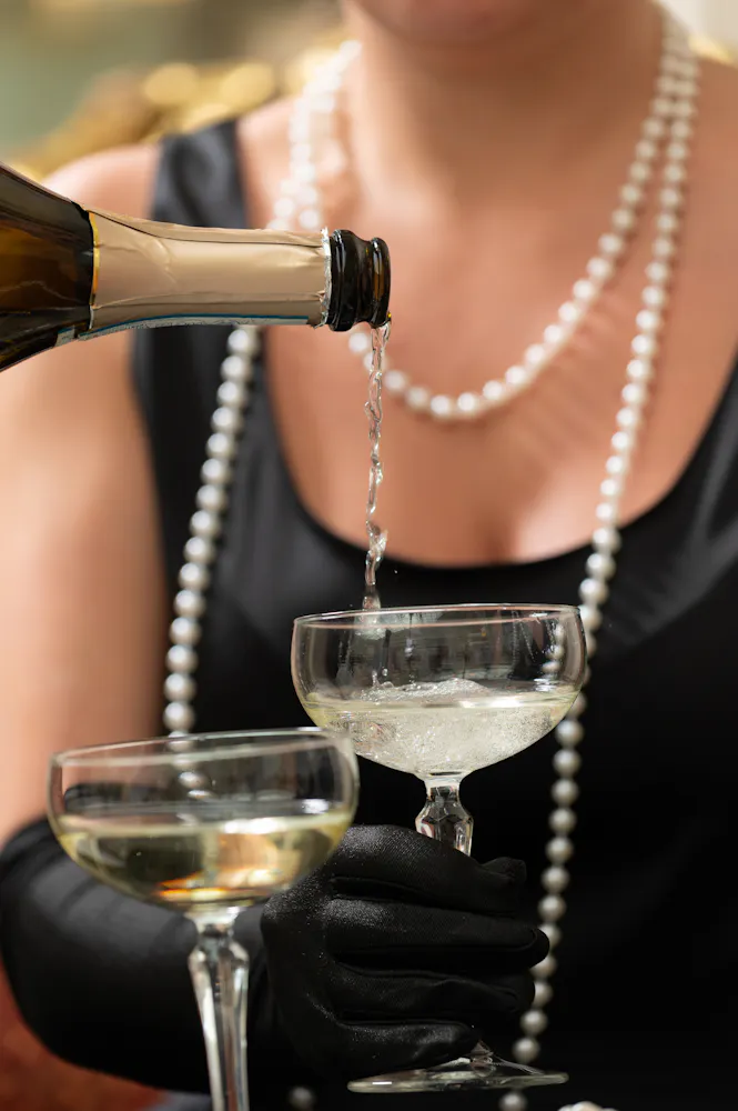 a woman holding a glass of wine