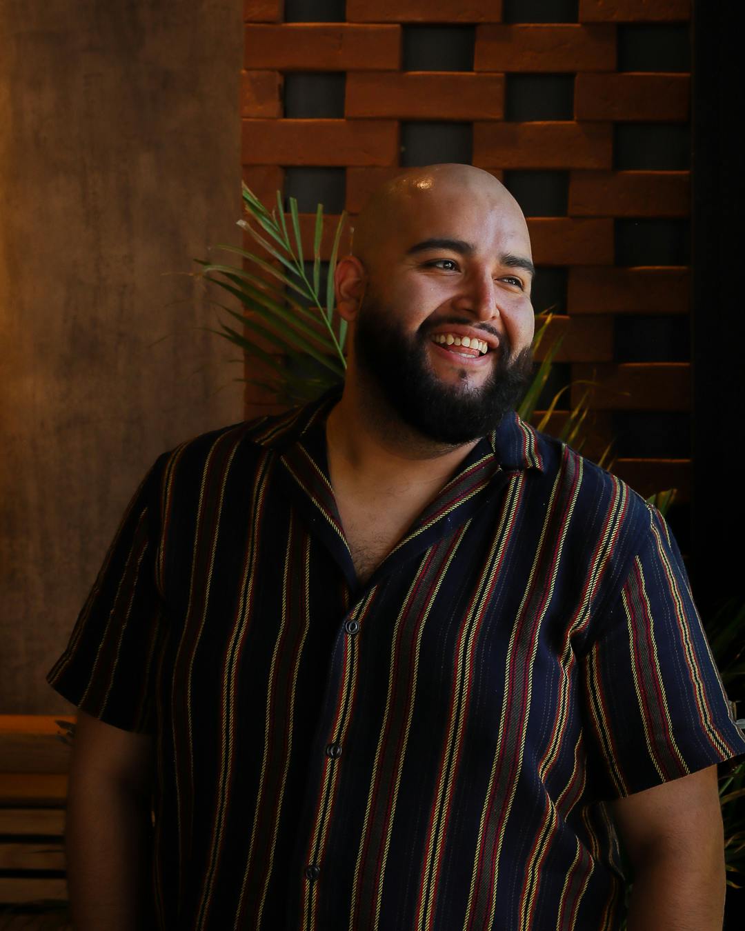 a man in a striped shirt