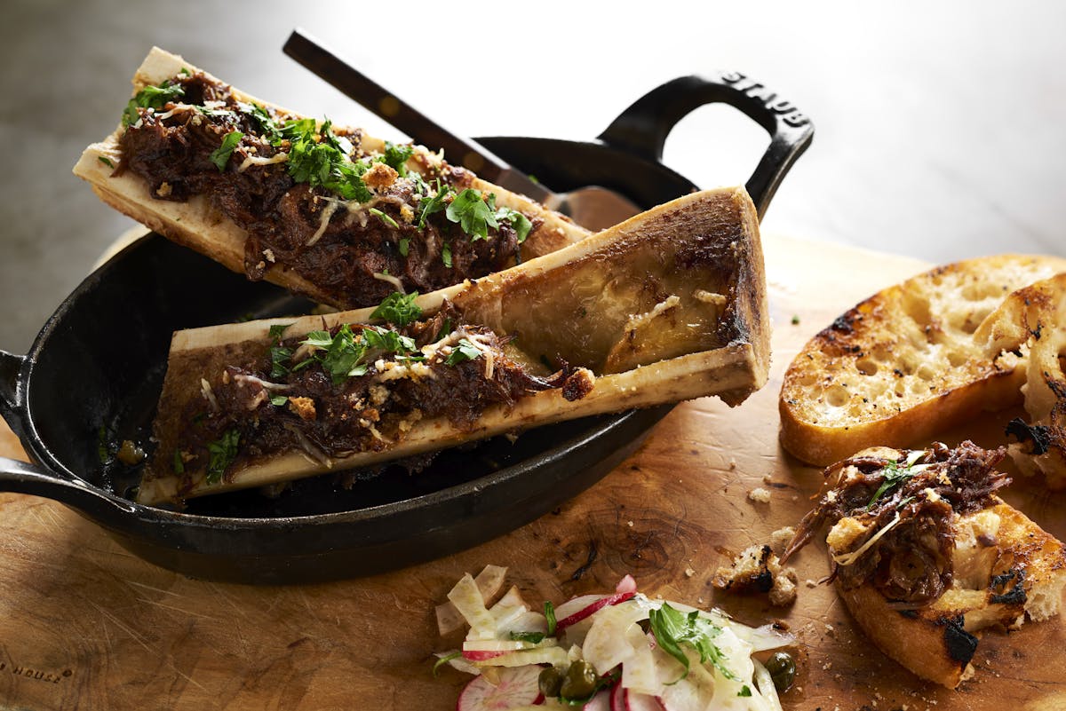 bone marrow dish in a cast iron skillet