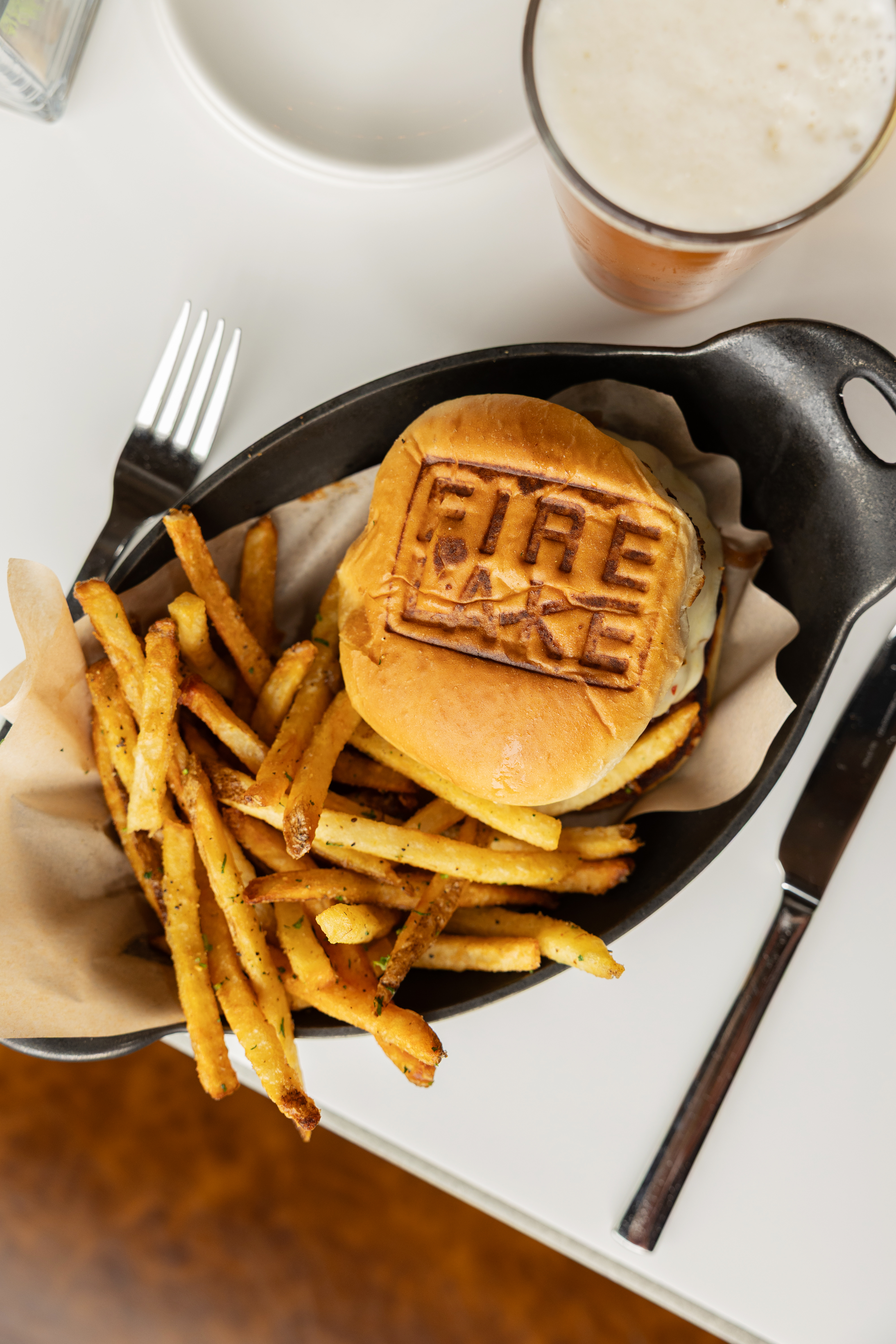 a plate of food with a burger and fries
