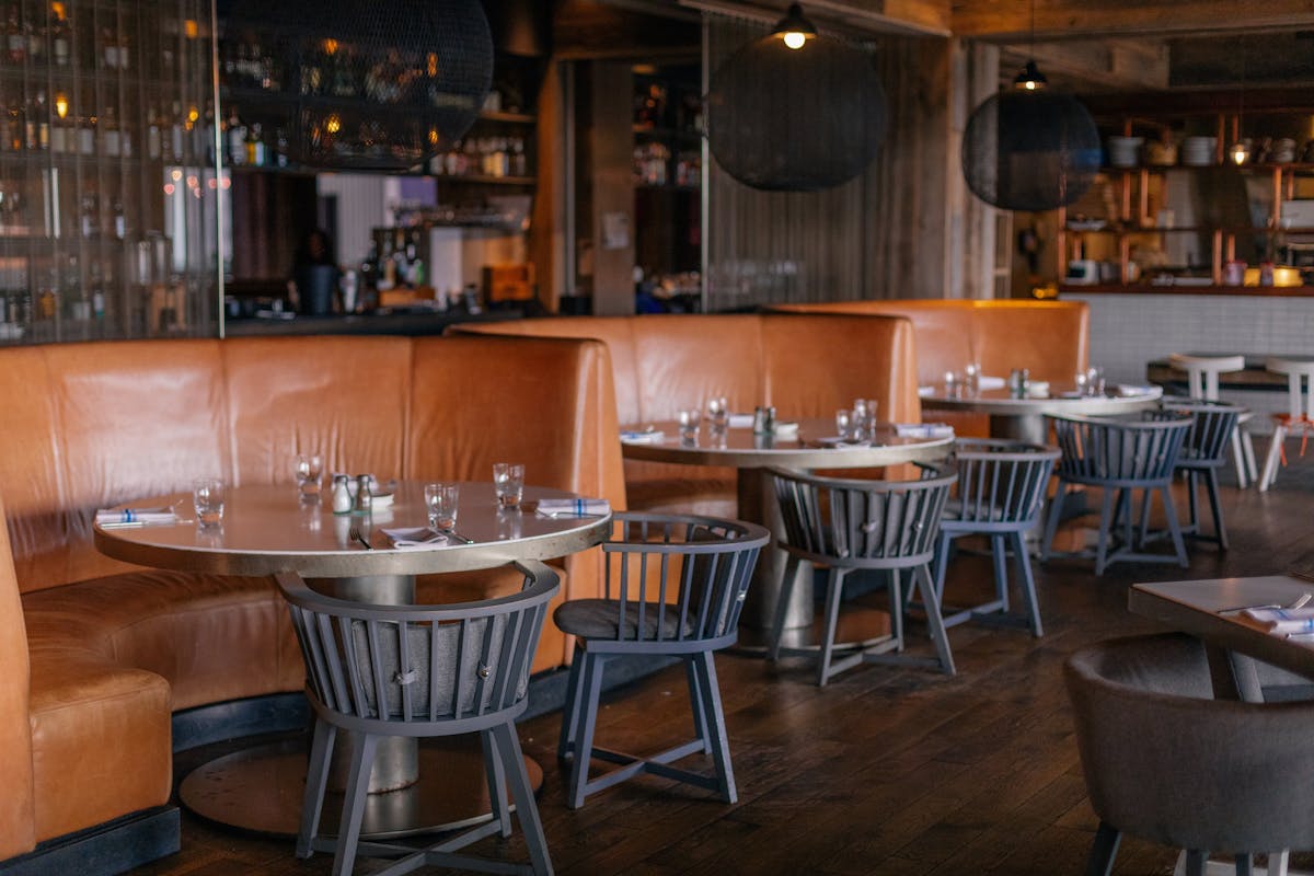 a kitchen with a dining table