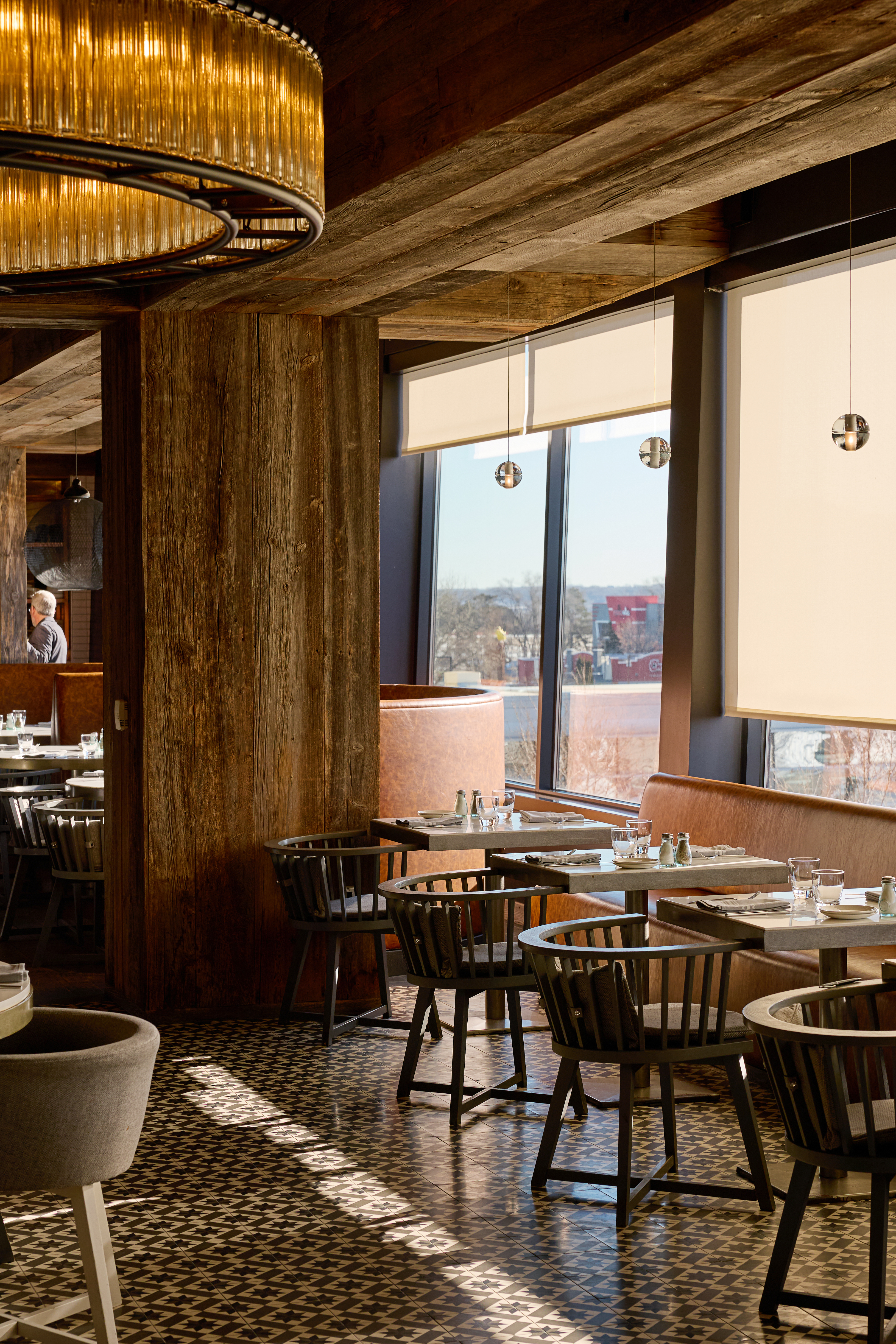 a restaurant with tables and chairs