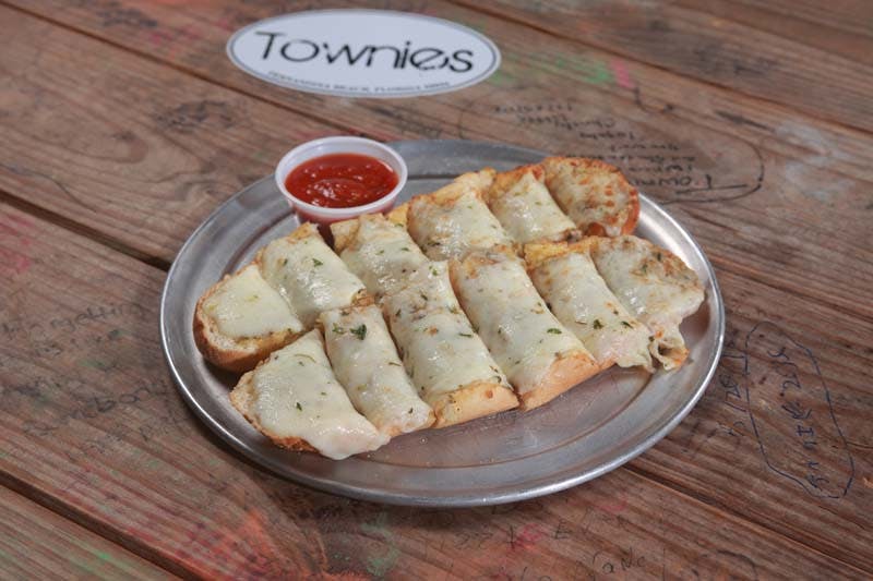 a plate of food on a wooden table