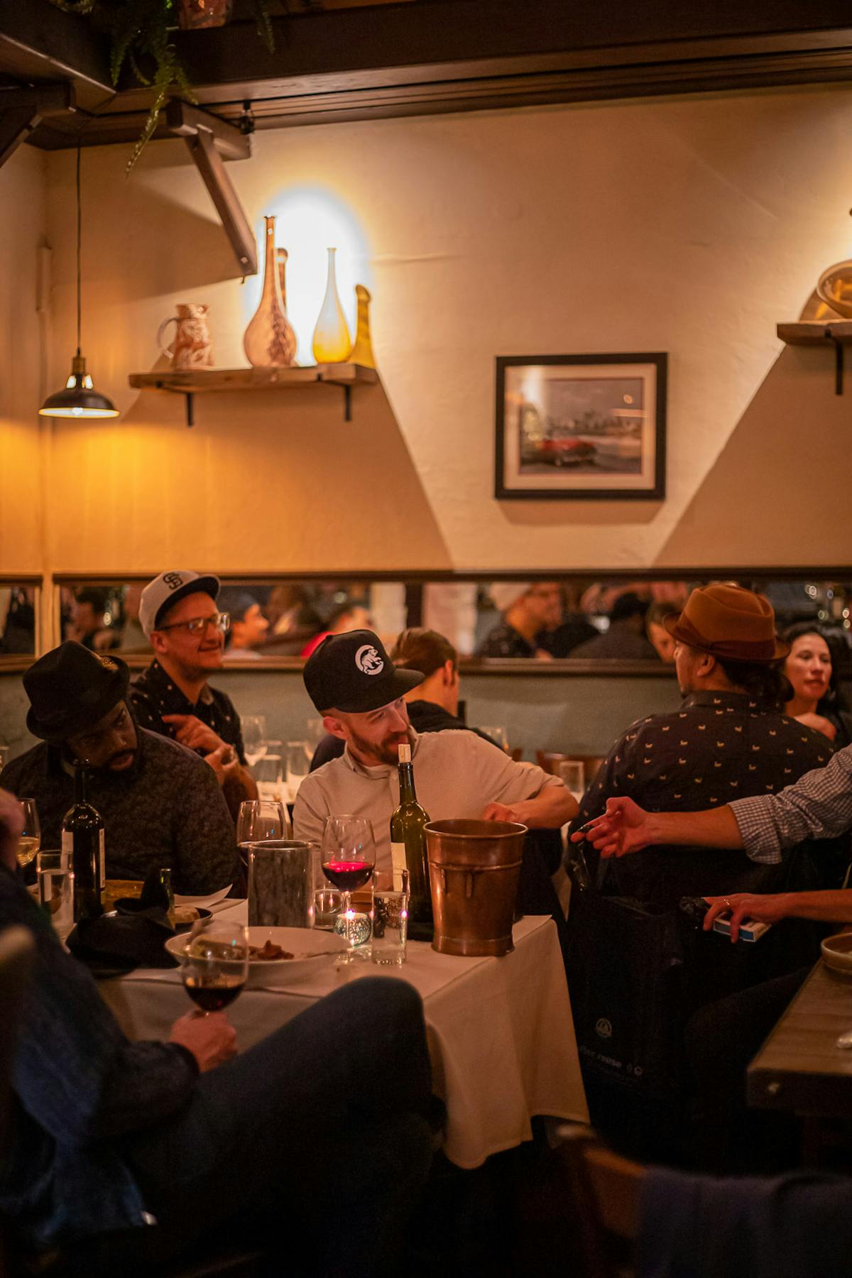 a group of people sitting at a table in a room