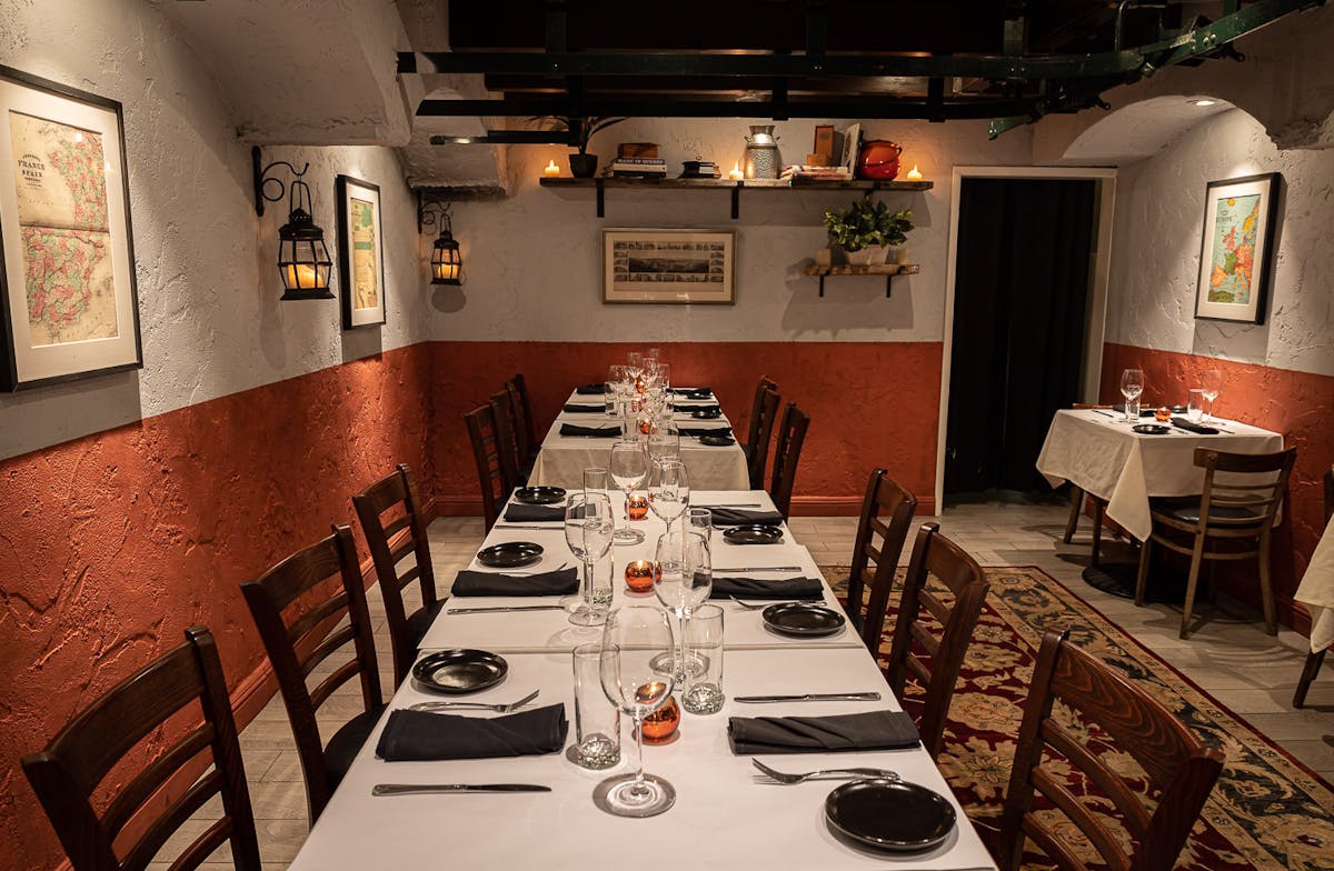 a kitchen with a dining table