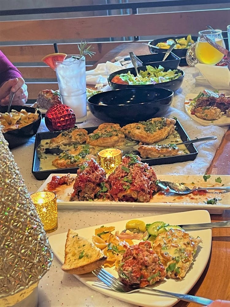 a bunch of different types of food on a table