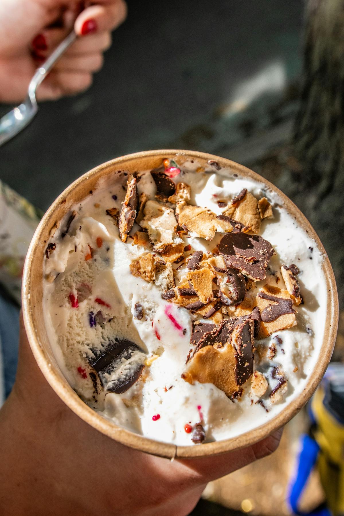 a close up of a slice of pizza on a plate