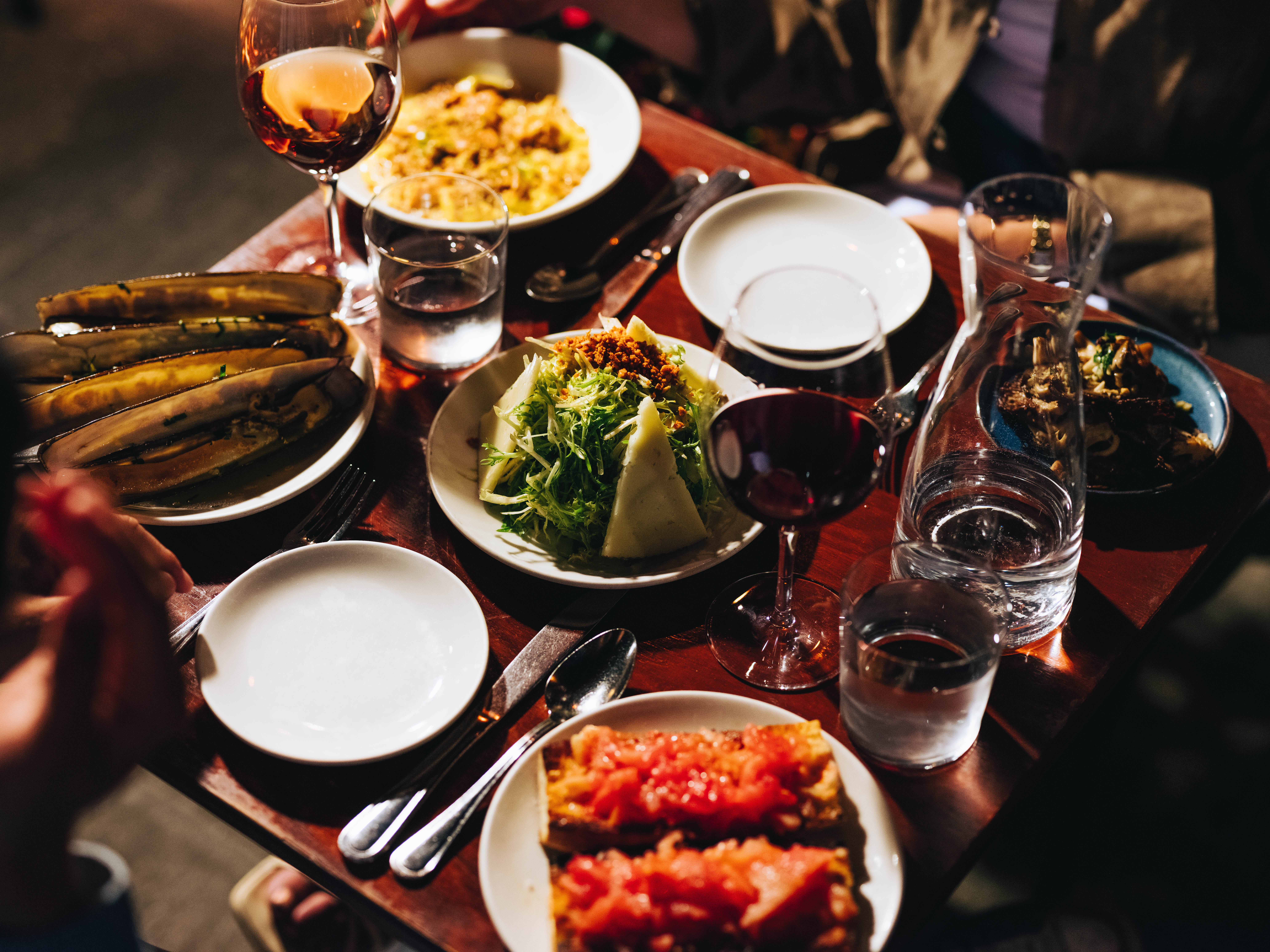 a table topped with plates of food on a plate