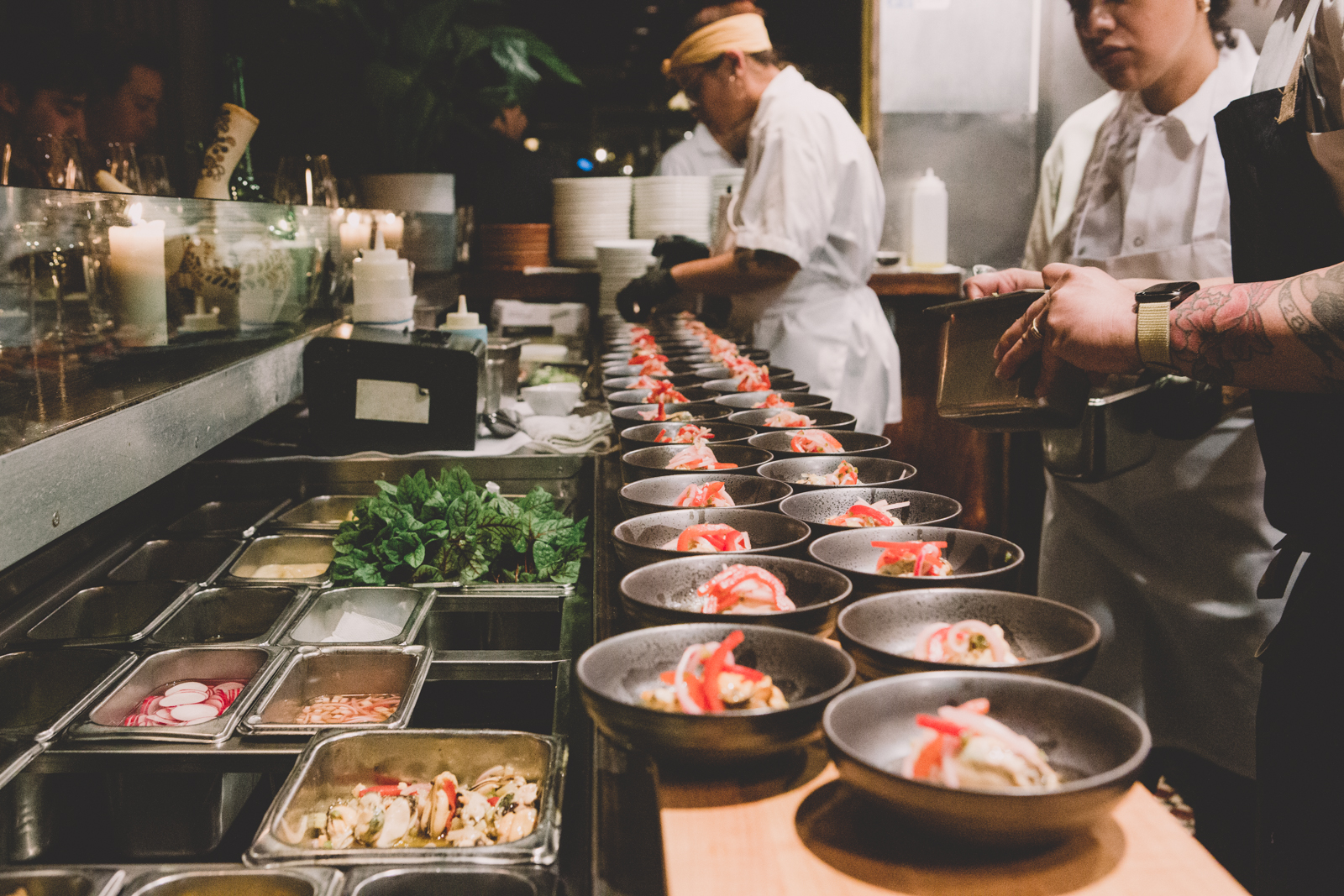 a person cooking in a kitchen preparing food