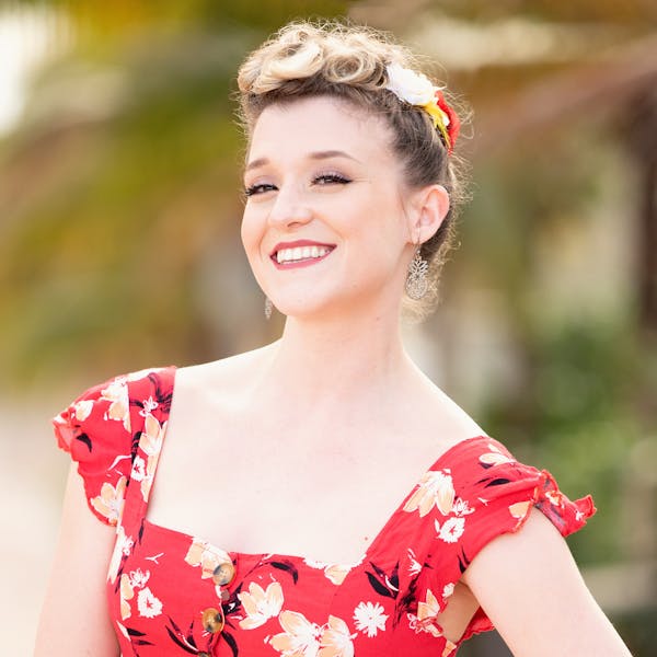 a person wearing a pink shirt