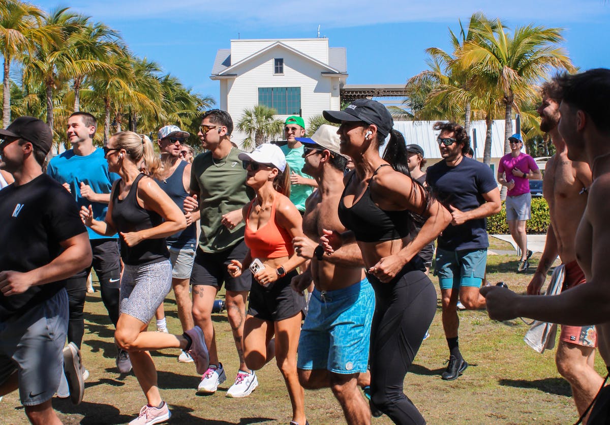 a group of people standing in front of a crowd