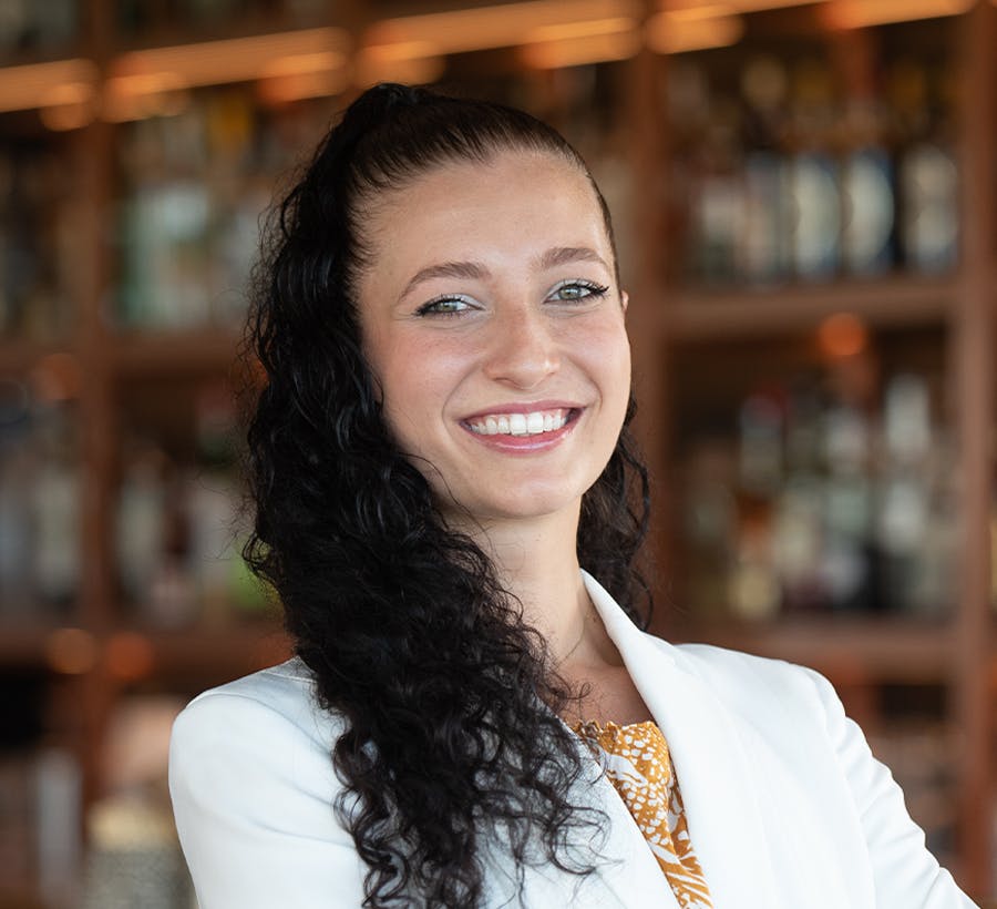 a woman smiling for the camera