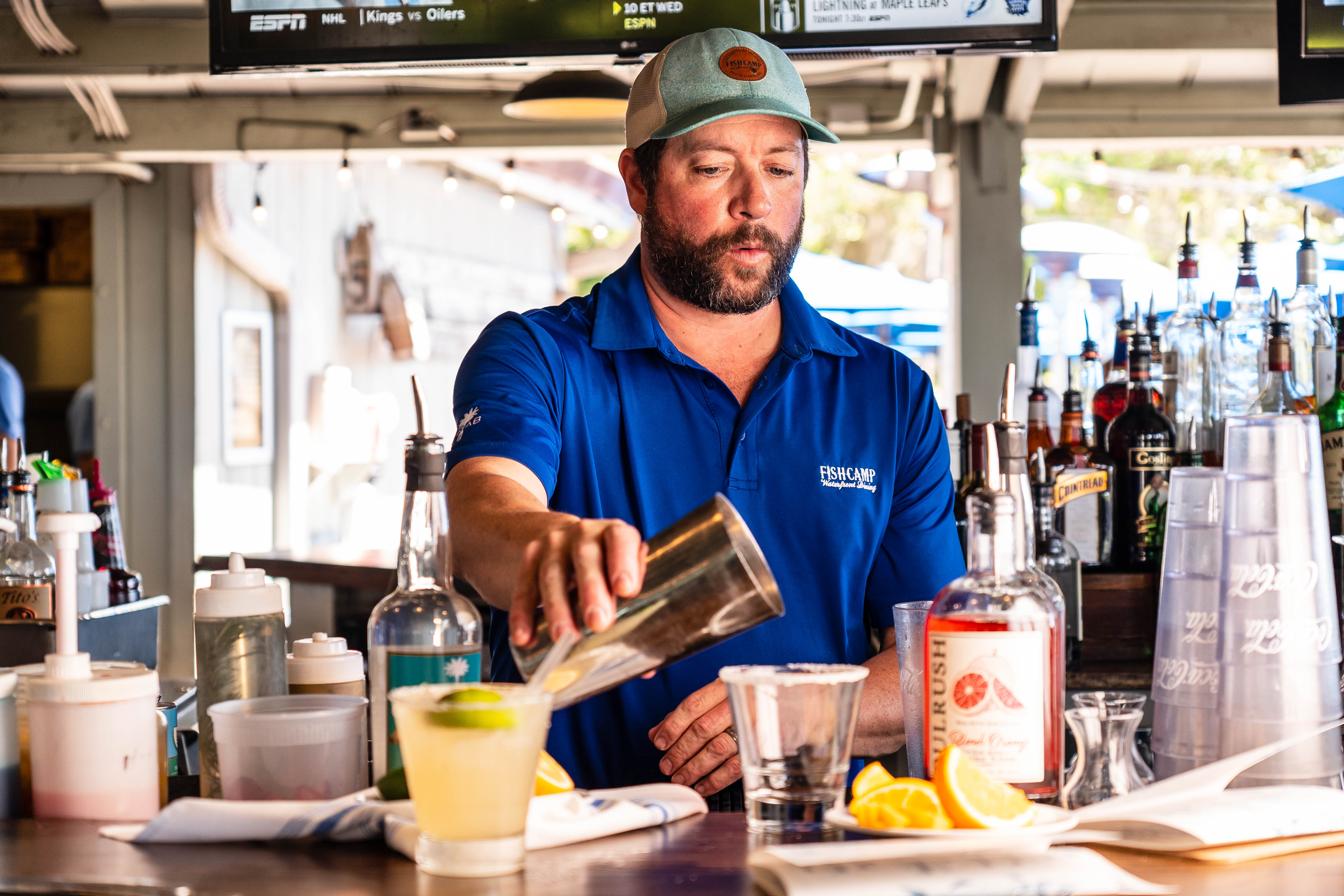 a man preparing food in a restaurant