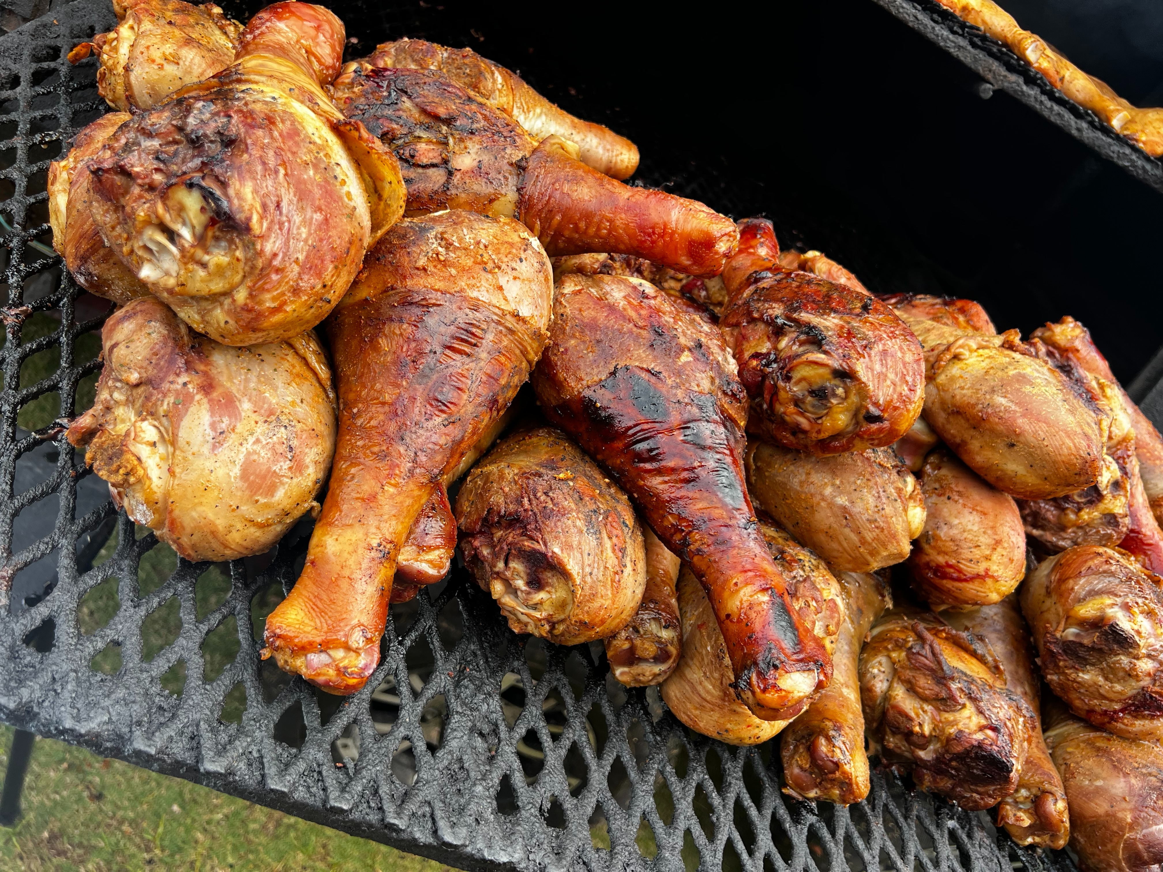 a pile of food on a grill