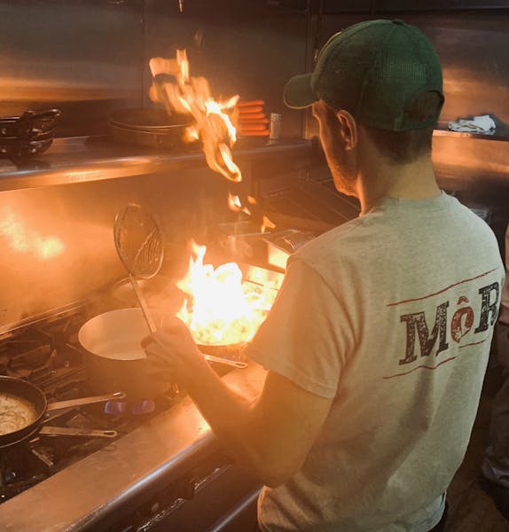 a person cooking in an oven