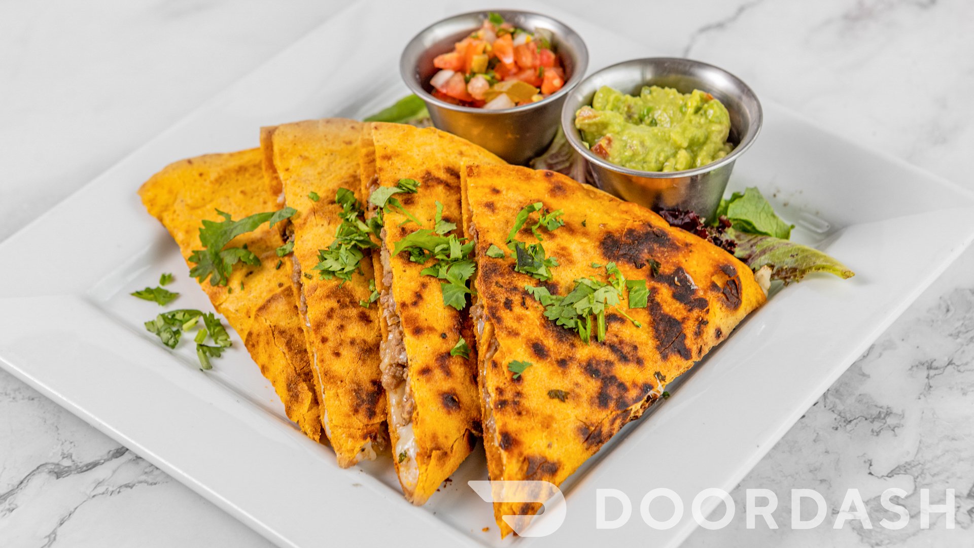 a quesadillas plate of food