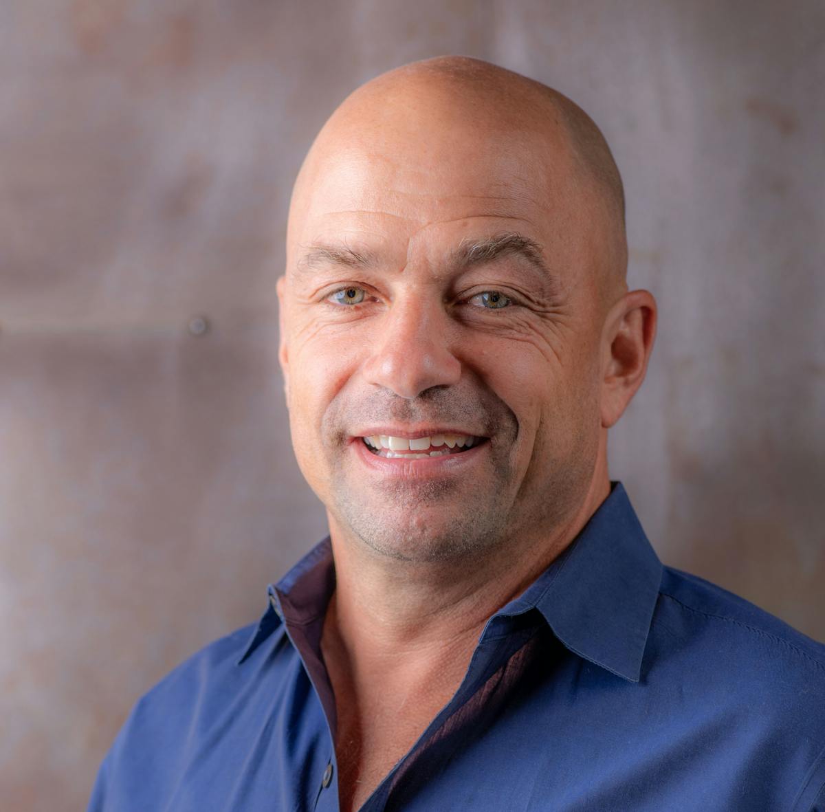 a man wearing a blue shirt