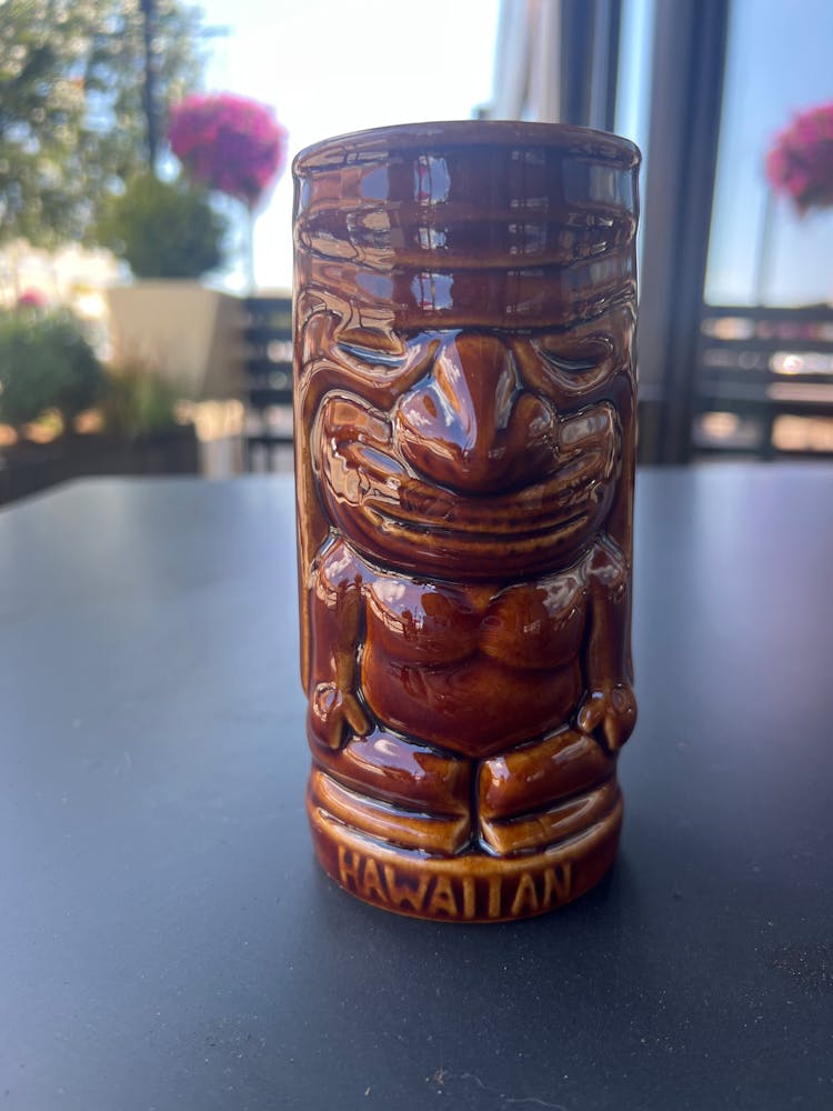 a close up of a glass vase on a table